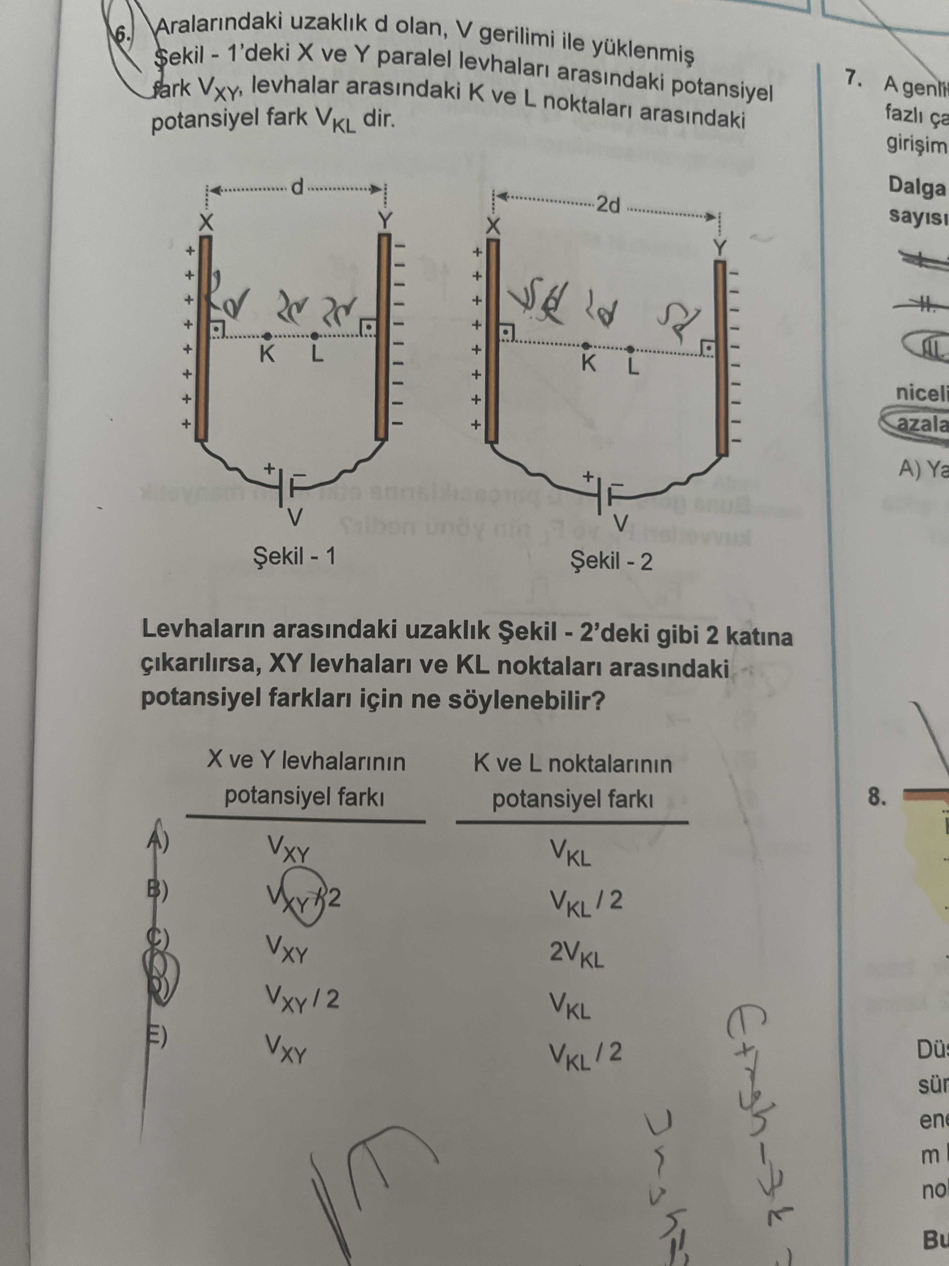 Aralarındaki uzaklık d olan, V gerilimi ile yüklenmiş Şekil - 1'deki X ve Y paralel levhaları