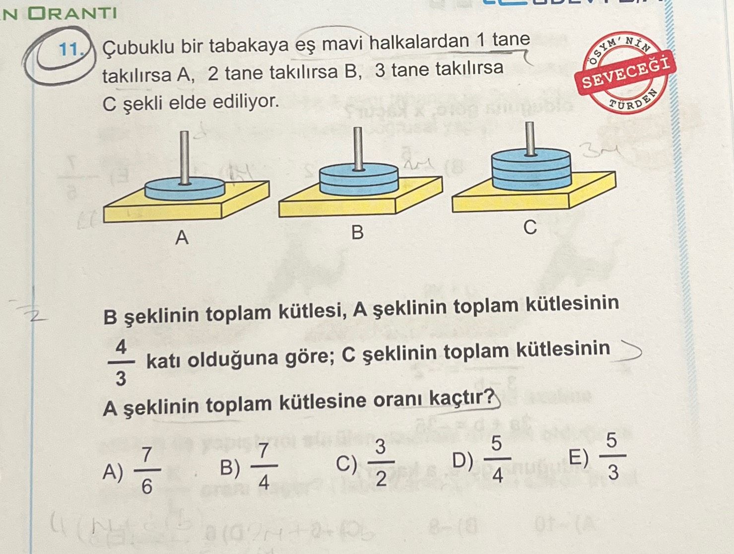 Çubuklu bir tabakaya eş mavi halkalardan 1 tane takılırsa A, 2 tane takılırsa B, 3 tane takılırsa C