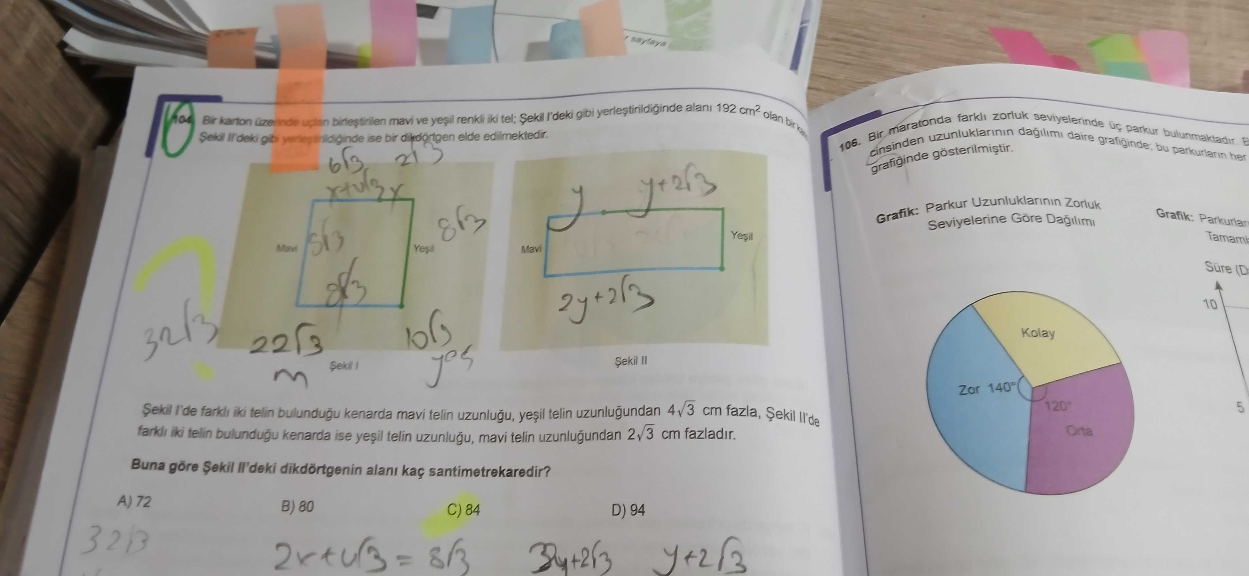 Bir karton üzerinde uçları birleştirilen mavi ve yeşil renkli iki tel; Şekil I'deki gibi