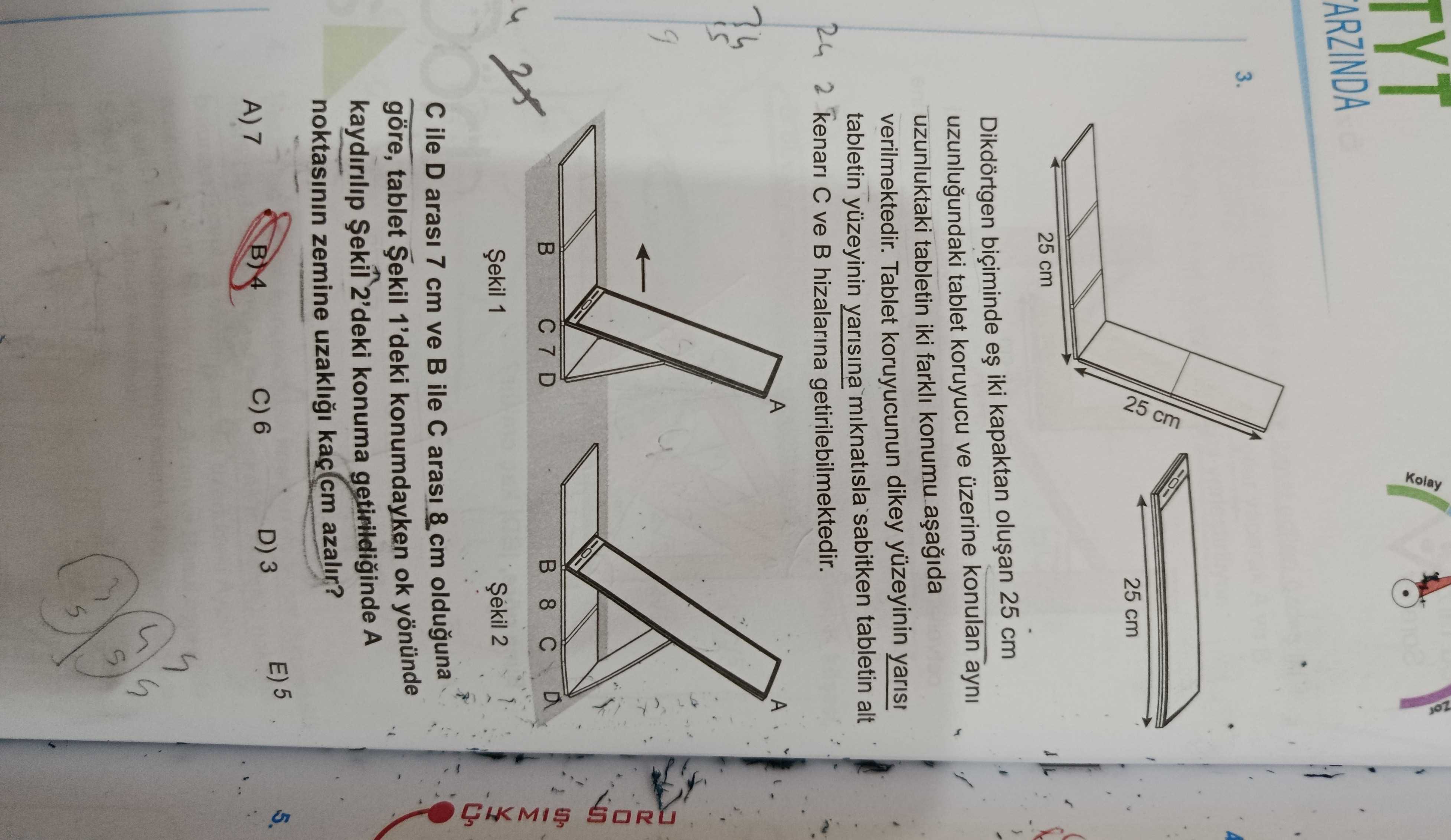 Dikdörtgen biçiminde eş iki kapaktan oluşan 25 cm uzunluğundaki tablet koruyucu ve üzerine konulan