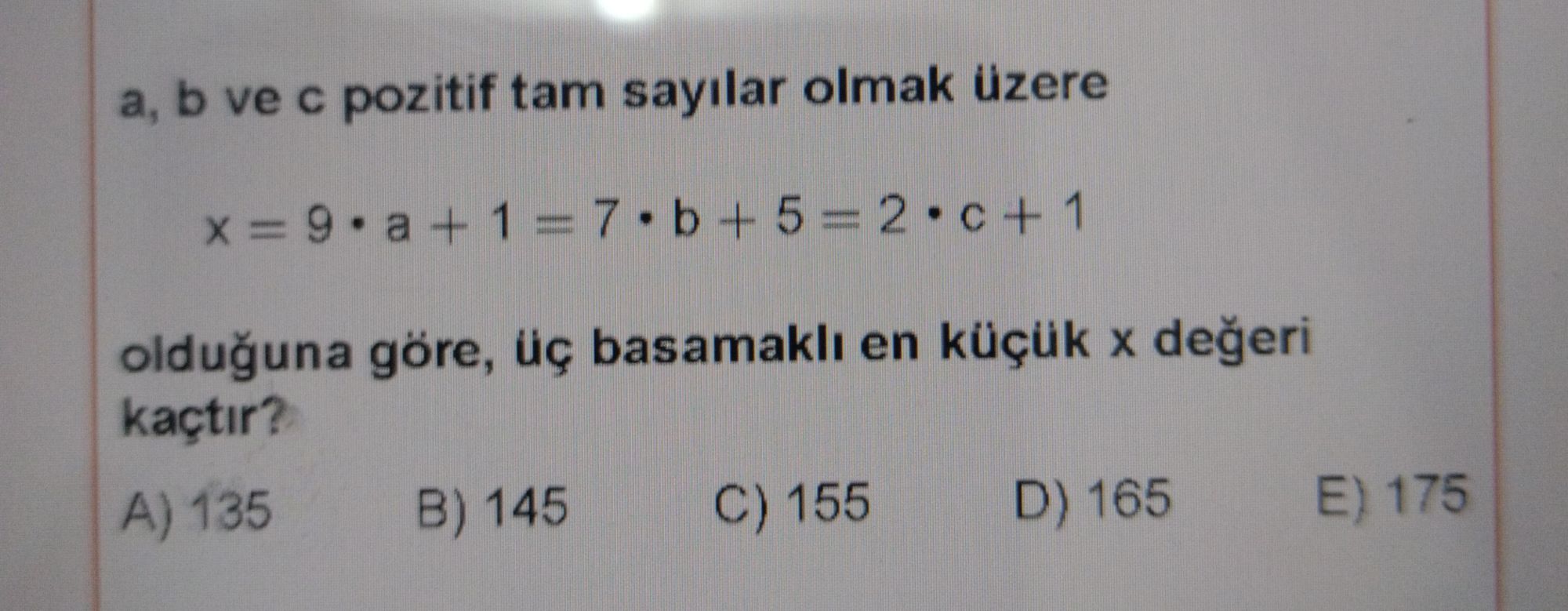 a, b ve c pozitif tam sayılar olmak üzere x = 9 • a + 1 = 7 • b + 5 = 2 • c + 1 olduğuna göre, üç basamaklı en küçük x değeri