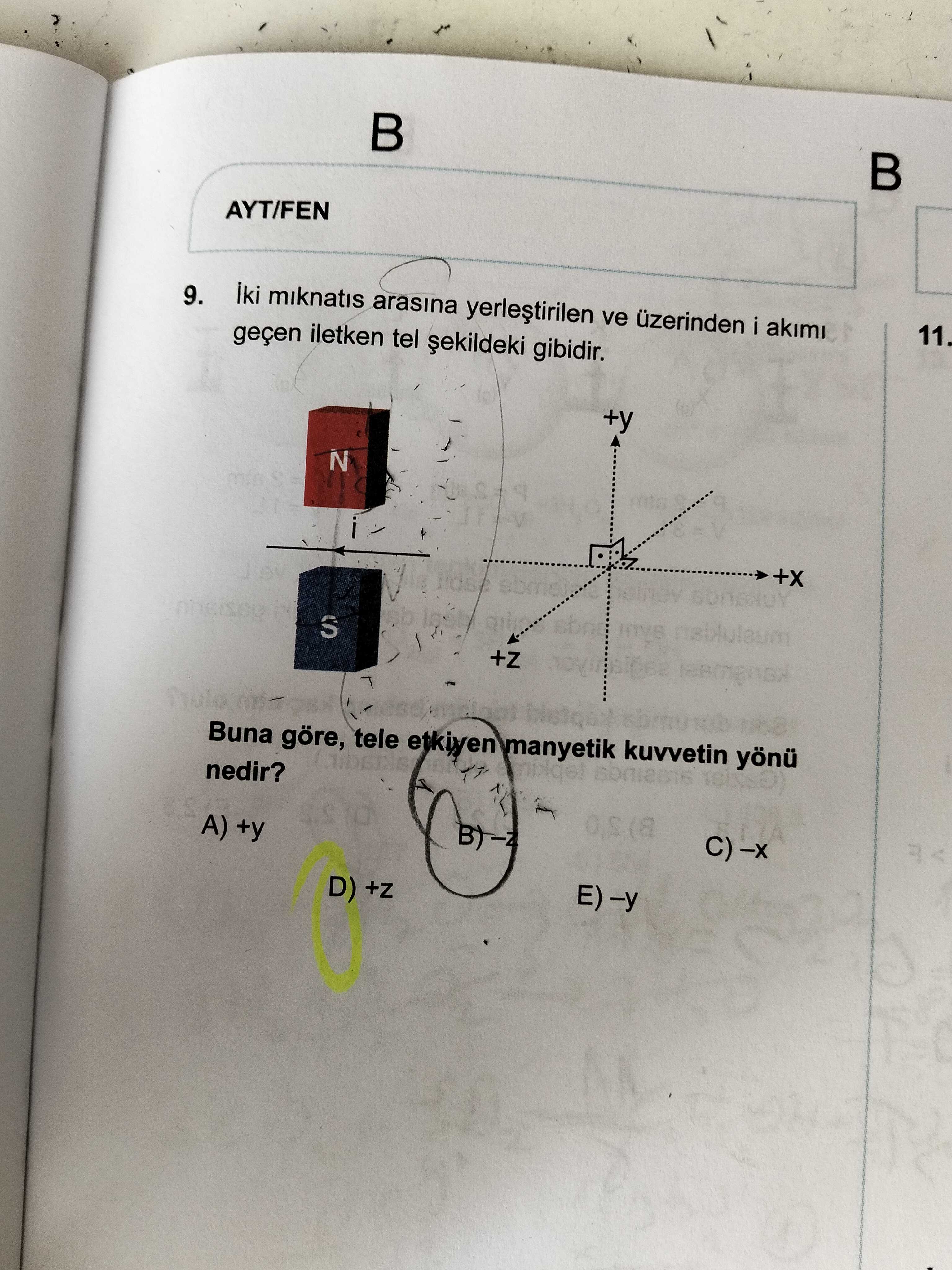 İki mıknatıs arasına yerleştirilen ve üzerinden i akımı geçen iletken tel şekildeki gibidir. Buna