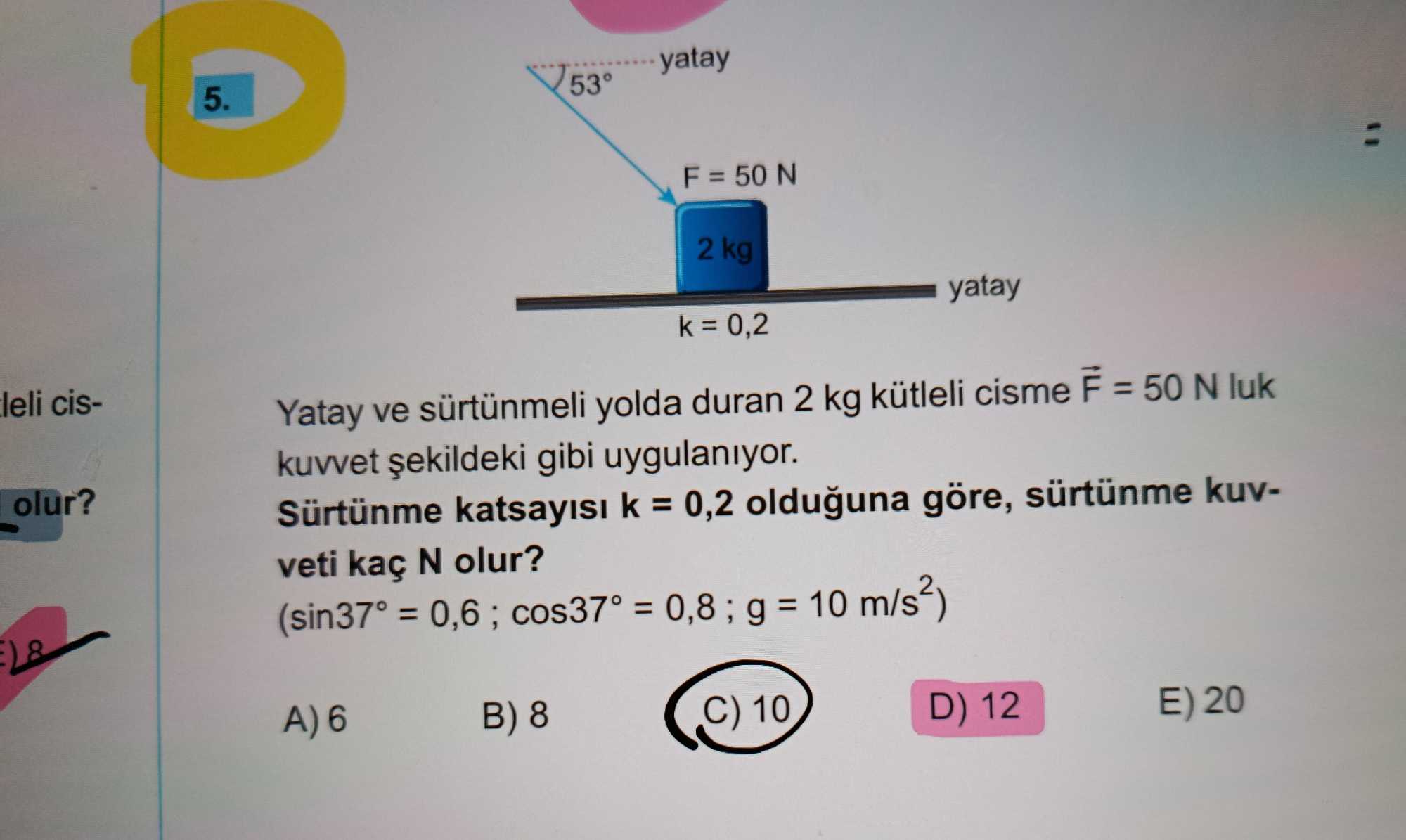Yatay ve sürtünmeli yolda duran 2 kg kütleli cisme F⃗ = 50 N luk kuvvet şekildeki gibi uygulanıyor