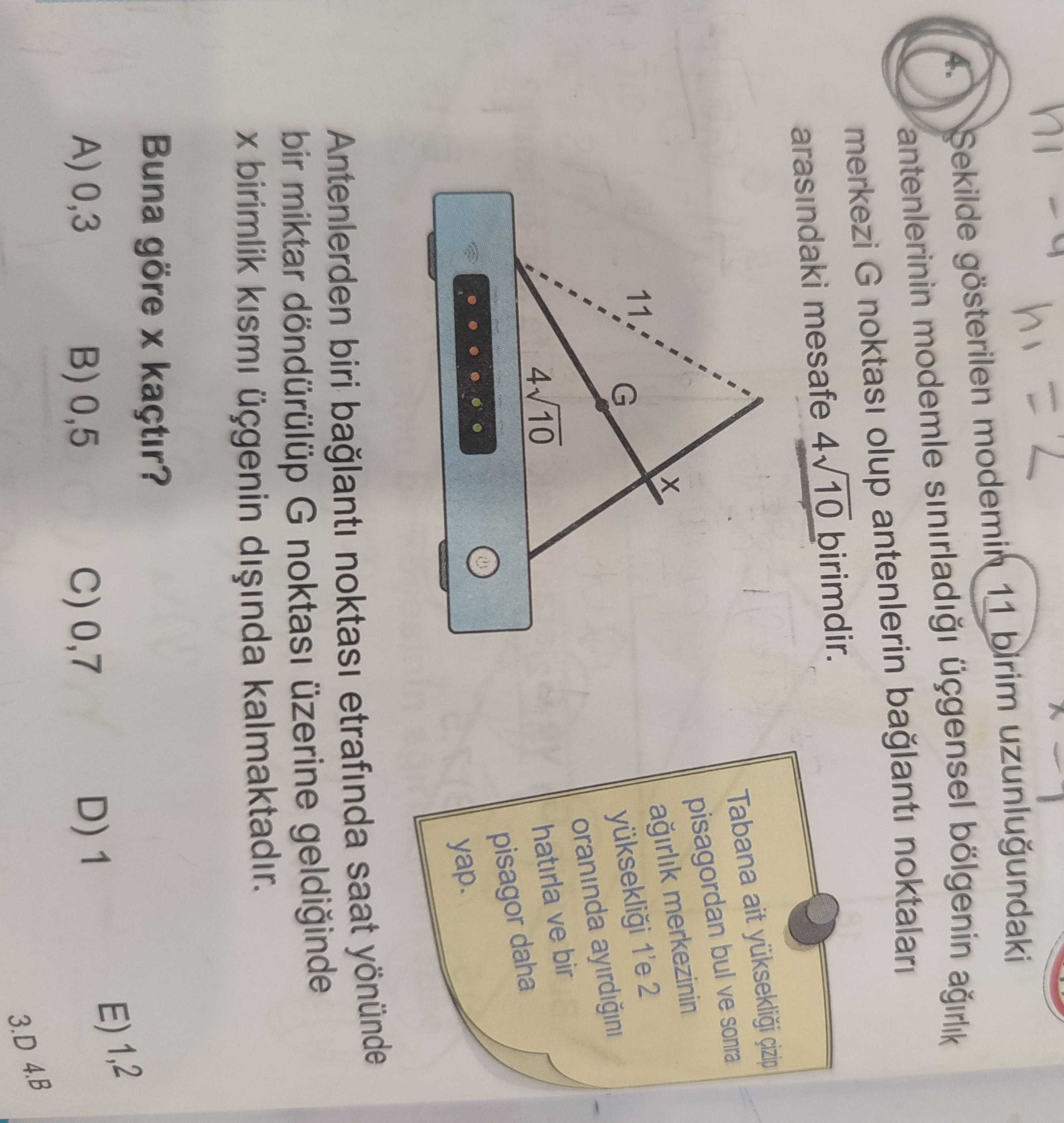 Şekilde gösterilen modemin 11 birim uzunluğundaki antenlerinin modemle sınırladığı üçgensel bölgenin