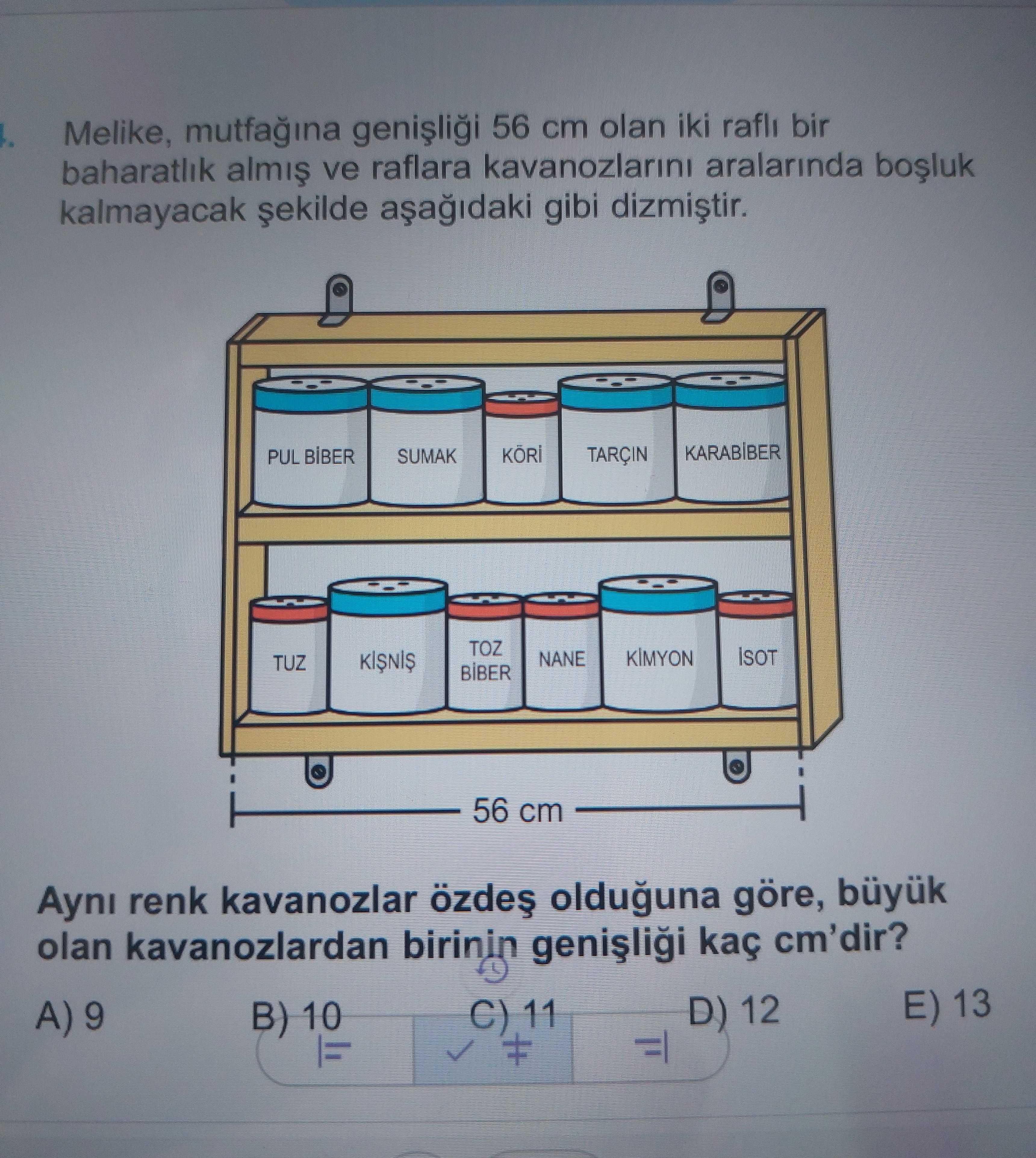 Melike, mutfağına genişliği 56 cm olan iki raflı bir baharatlık almış ve raflara kavanozlarını
