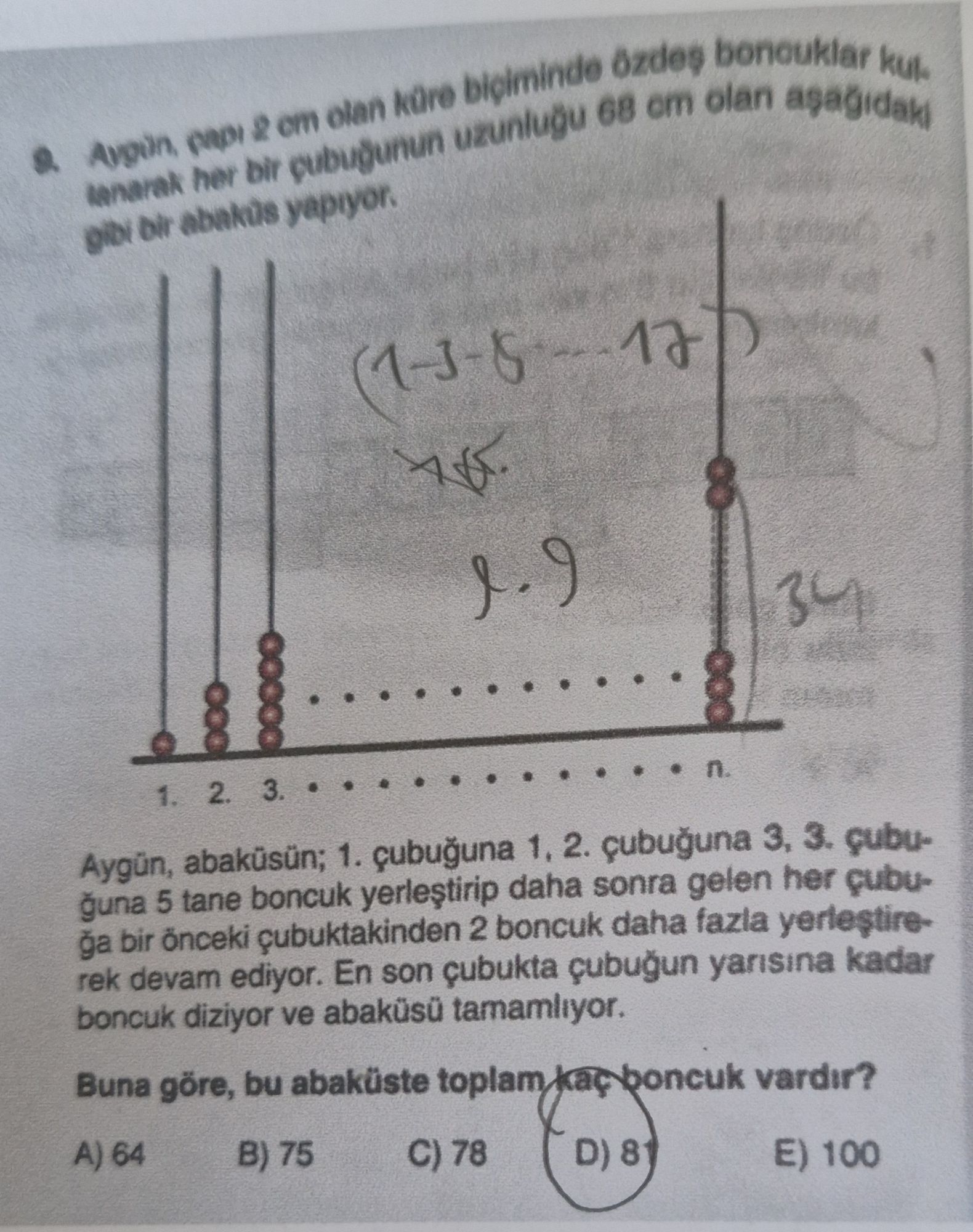 Aygün, çapı 2 cm olan küre biçiminde özdeş boncuklar kullanarak her bir çubuğunun uzunluğu 68 cm