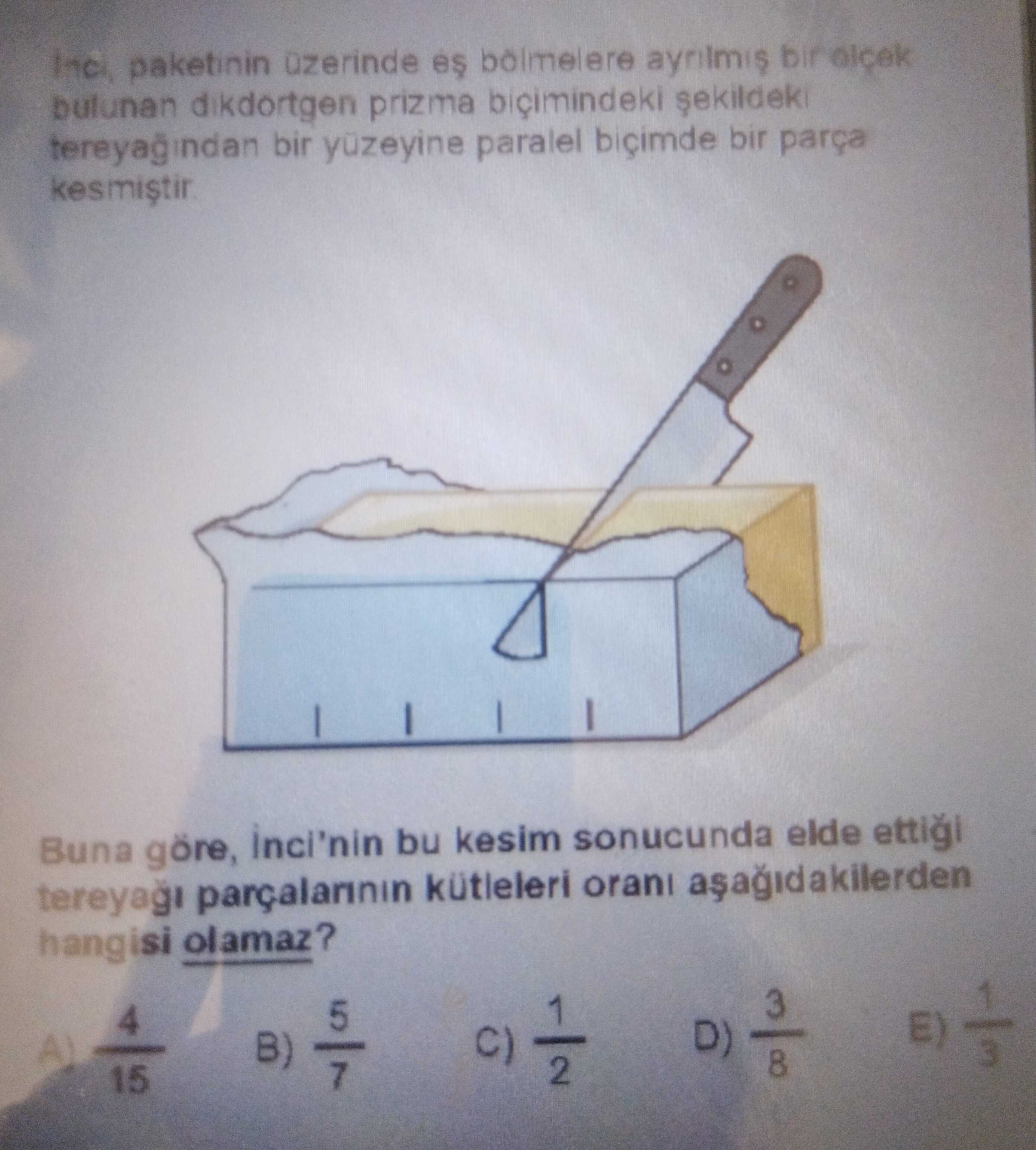 İnci, paketinin üzerinde eş bölmelere ayrılmış bir ölçek bulunan dikdörtgen prizma biçimindeki