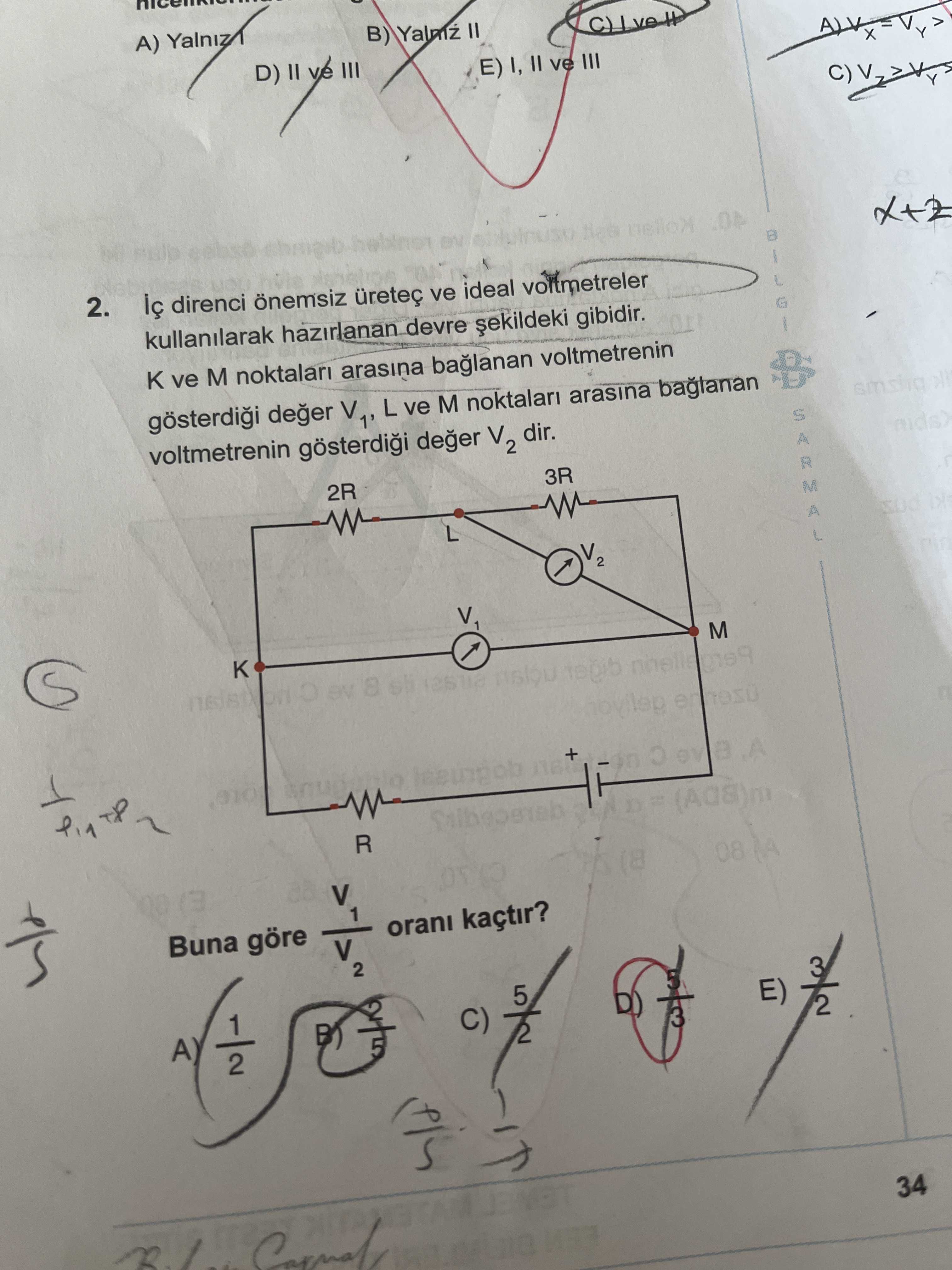 İç direnci önemsiz üreteç ve ideal voltmetreler kullanılarak hazırlanan devre şekildeki gibidir. K
