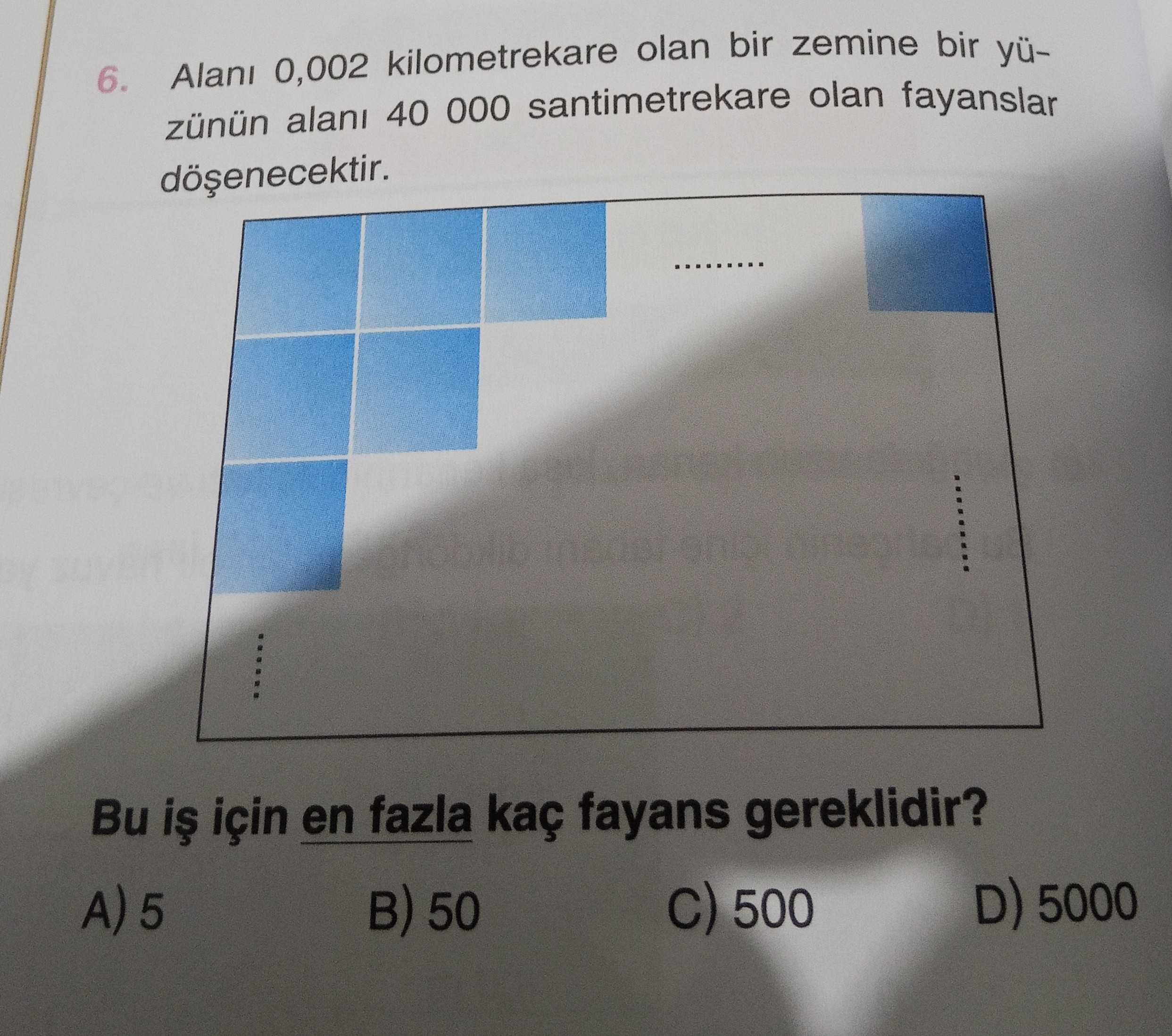Alanı 0,002 kilometrekare olan bir zemine bir yüzünün alanı 40 000 santimetrekare olan fayanslar