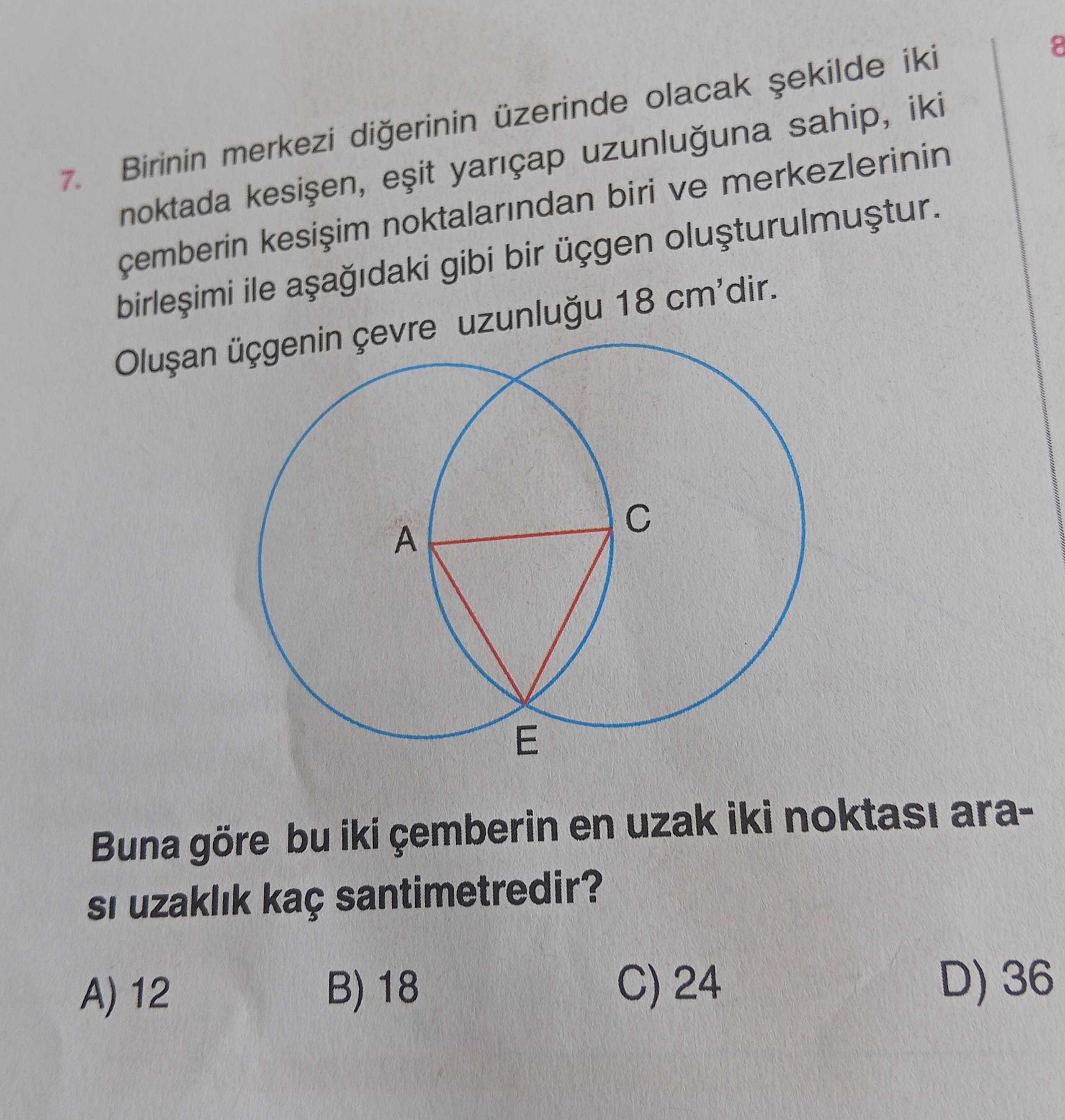 Birinin merkezi diğerinin üzerinde olacak şekilde iki noktada kesişen, eşit yarıçap uzunluğuna