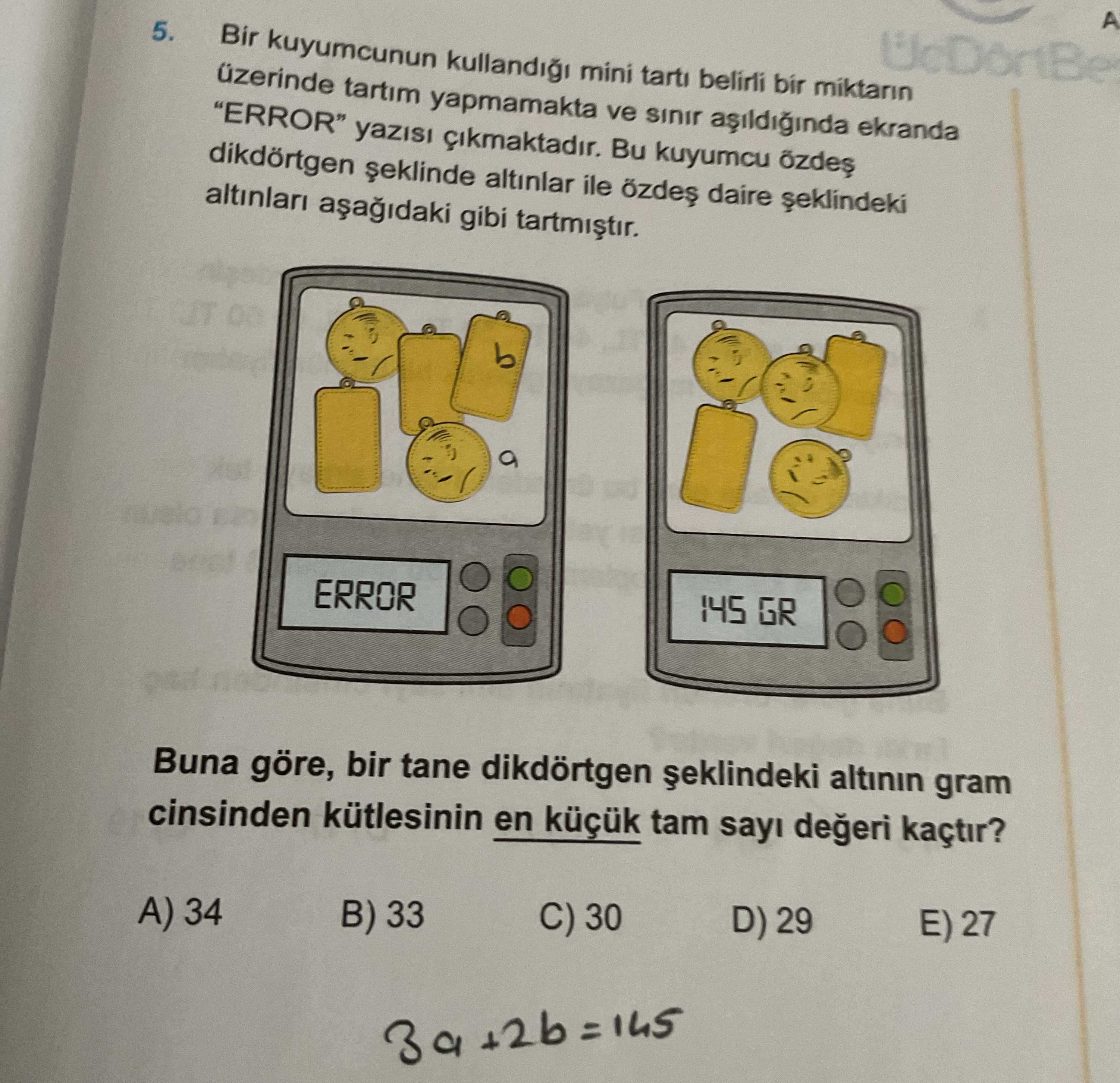 Bir kuyumcunun kullandığı mini tartı belirli bir miktarın üzerinde tartım yapmamakta ve sınır