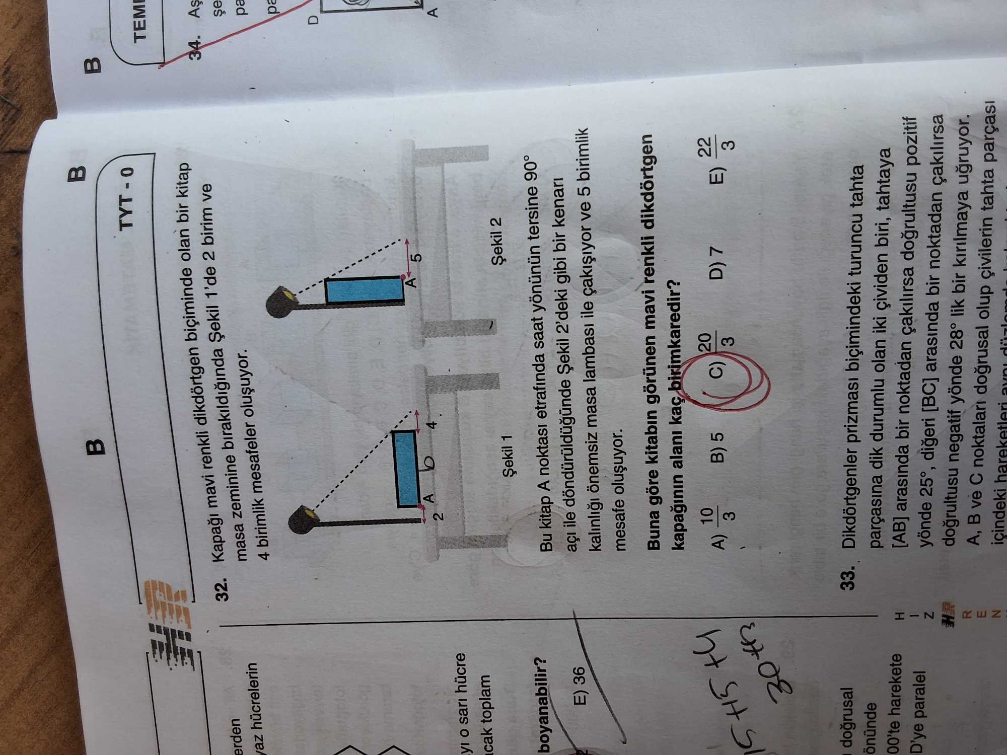 Kapağı mavi renkli dikdörtgen biçiminde olan bir kitap masa zeminine bırakıldığında Şekil 1'de 2
