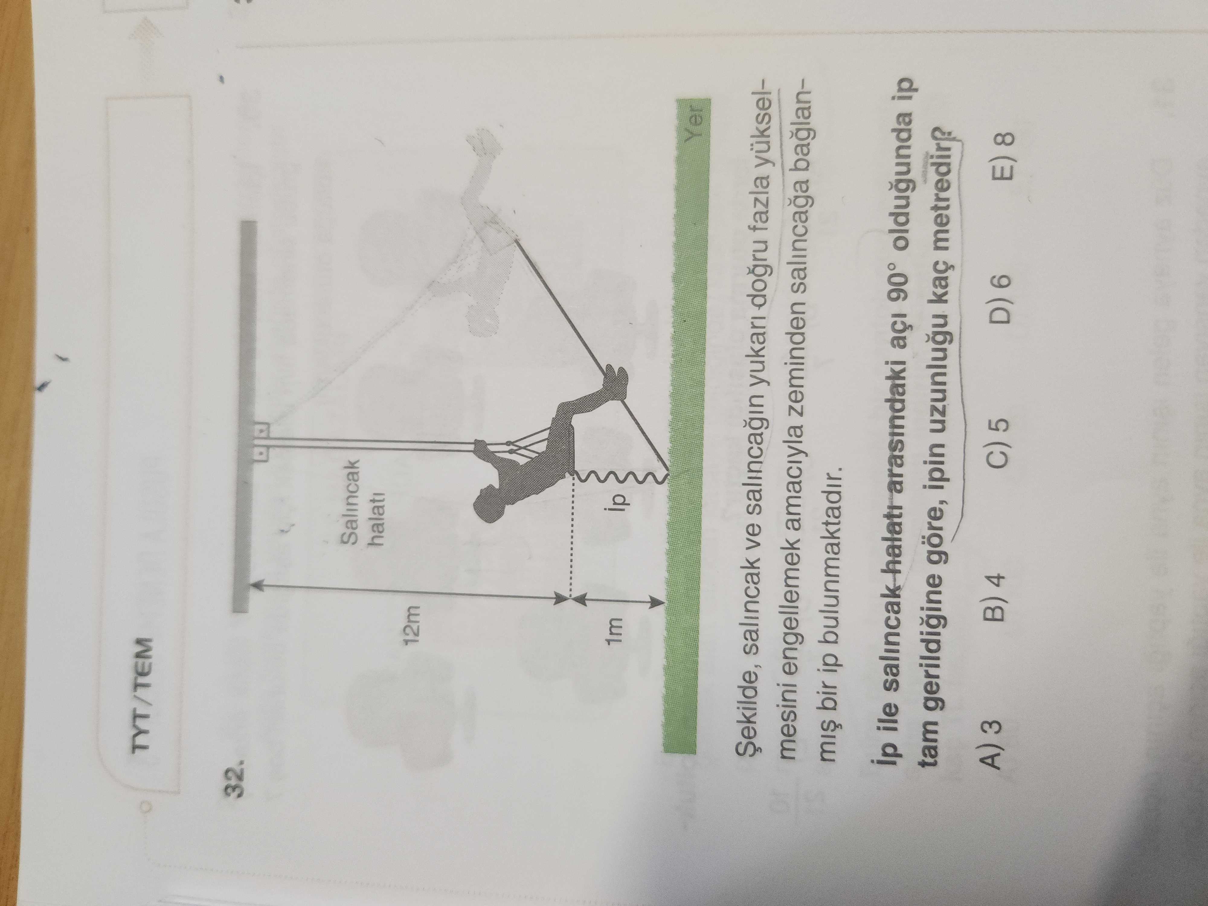 Şekilde, salıncağın yukarı doğru fazla yükselmesini engellemek amacıyla zeminden salıncağa bağlanmış