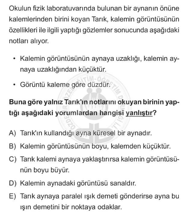 Okulun fizik laboratuvarında bulunan bir aynanın önüne kalemlerinden birini koyan Tarık, kalemin