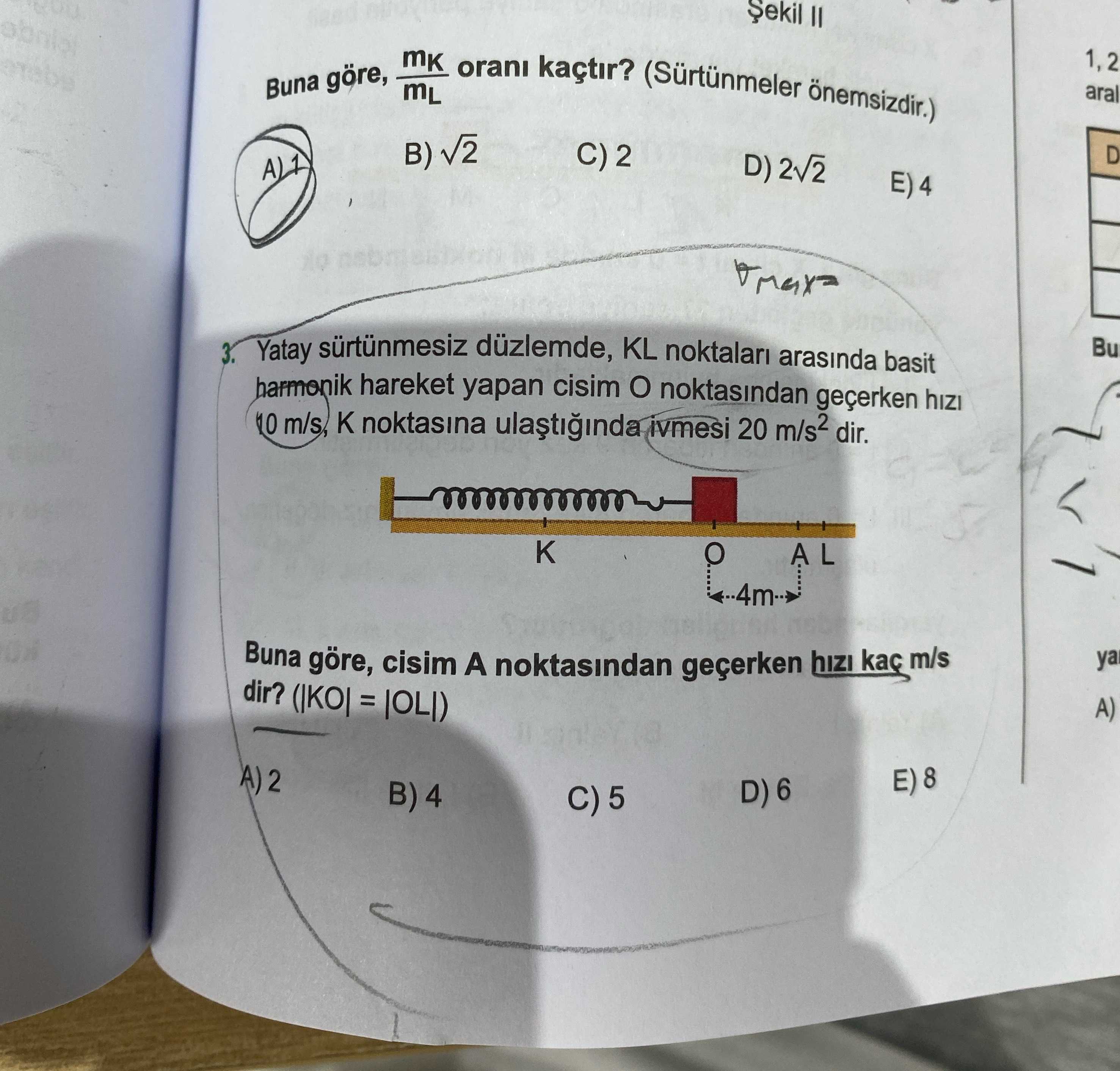 Yatay sürtünmesiz düzlemde, KL noktaları arasında basit harmonik hareket yapan cisim O noktasından