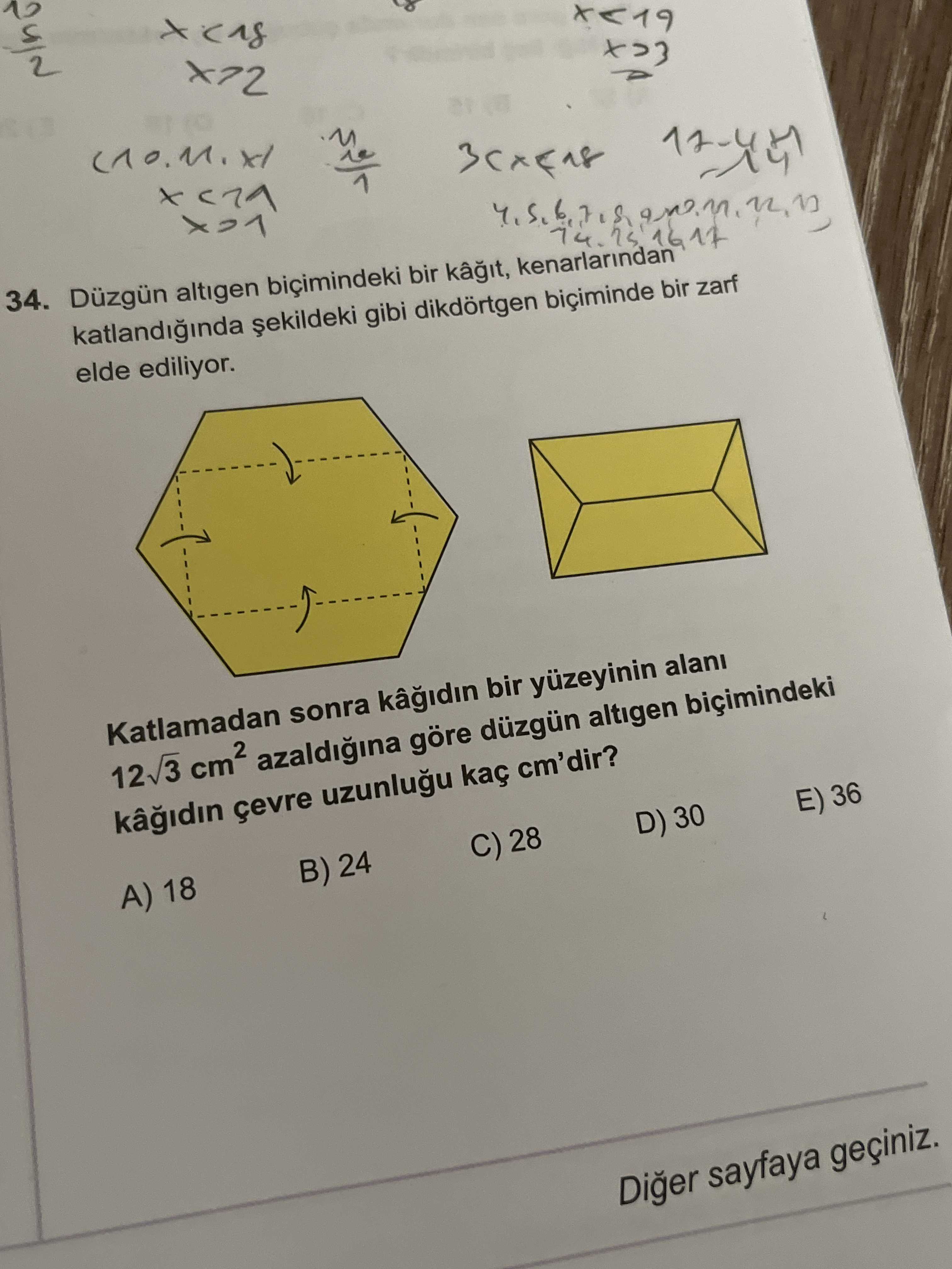 Düzgün altigen biçimindeki bir kâğıt, kenarlarından katlandığında şekildeki gibi dikdörtgen
