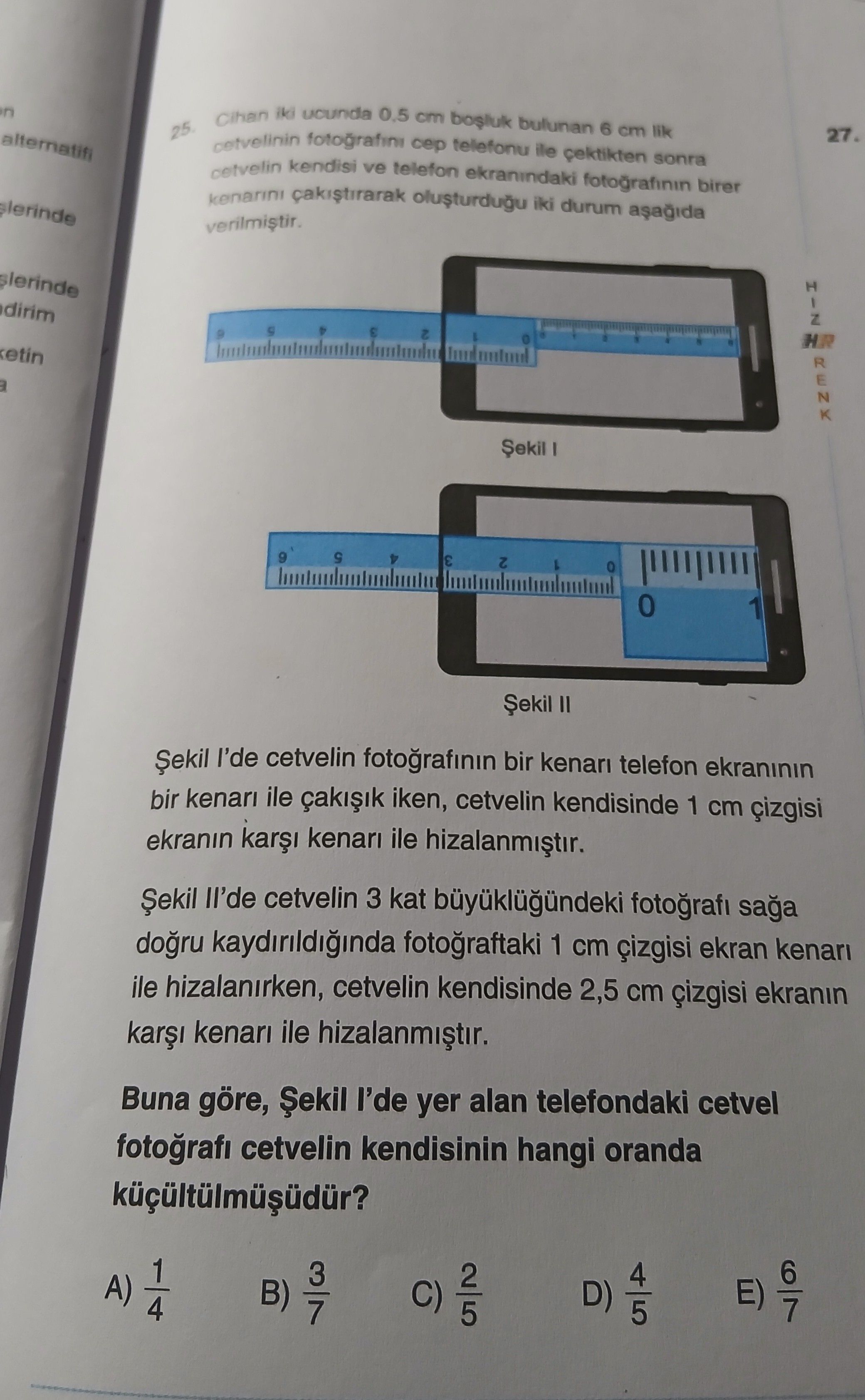 Cihan iki ucunda 0,5 cm boşluk bulunan 6 cm lik cetvelinin fotoğrafını cep telefonu ile çektikten
