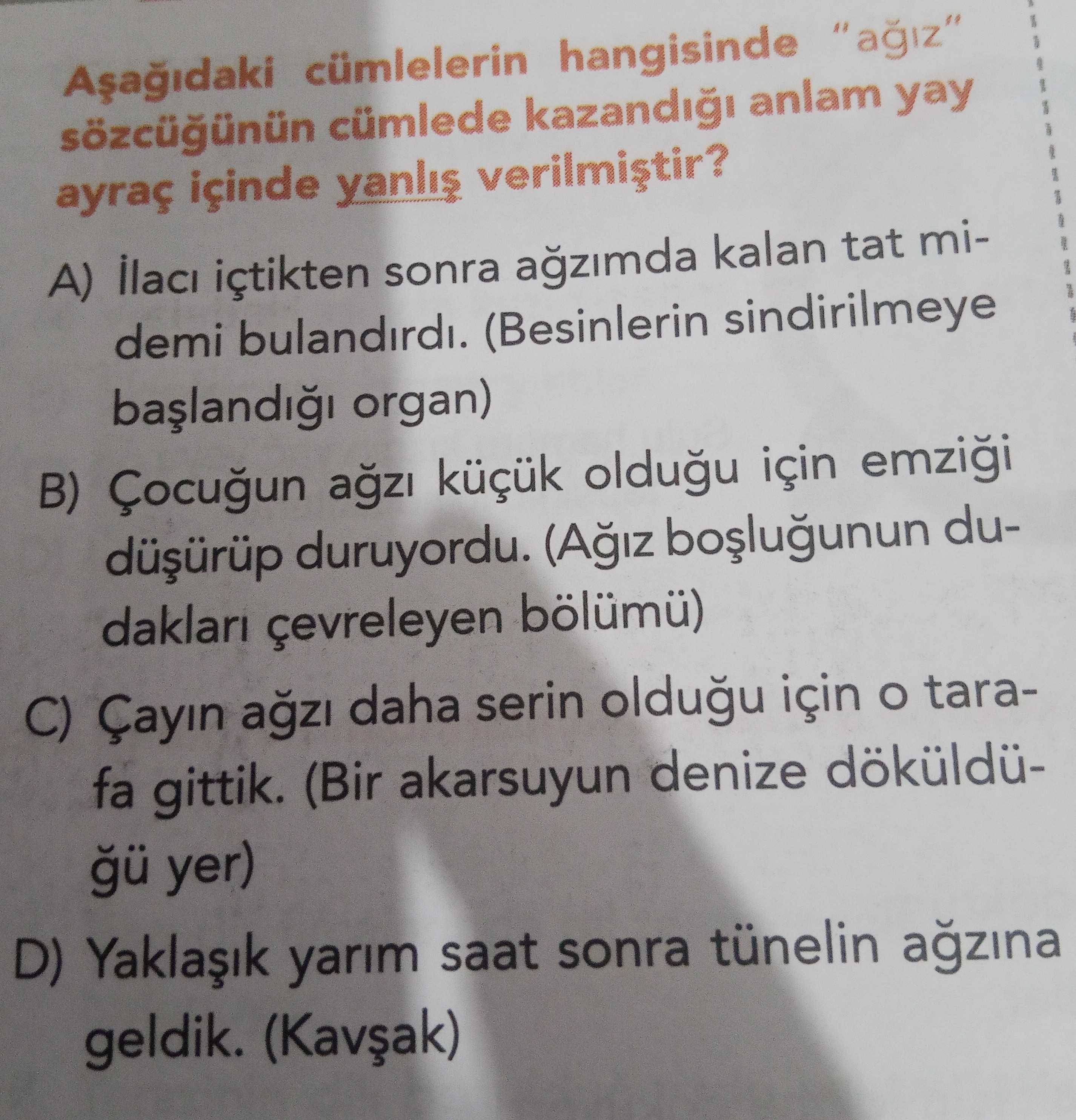Aşağıdaki cümlelerin hangisinde "ağız" sözcüğünün cümlede kazandığı anlam yay ayraç içinde yanlış