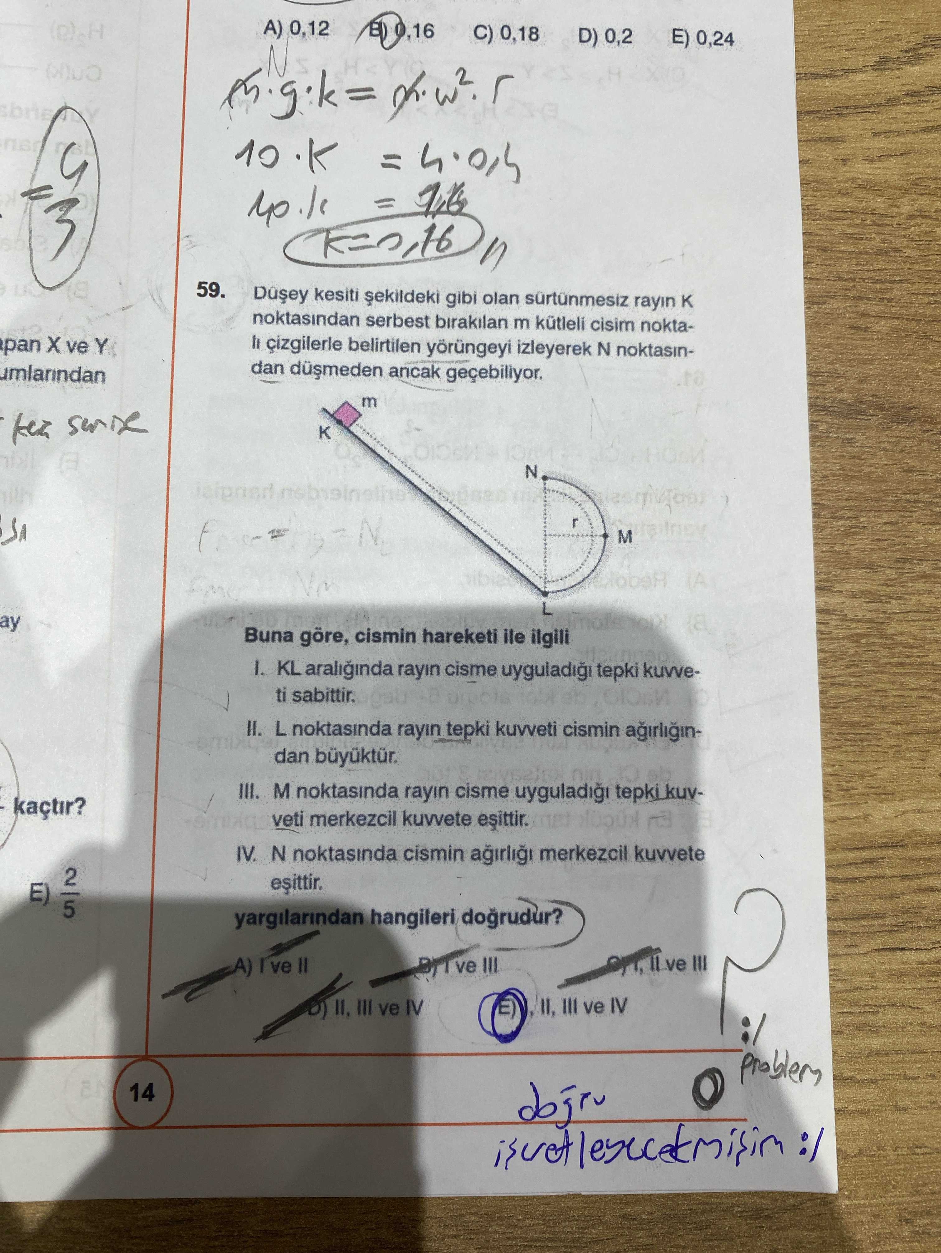 Düşey kesiti şekildeki gibi olan sürtünmesiz rayın K noktasından serbest bırakılan m kütleli cisim