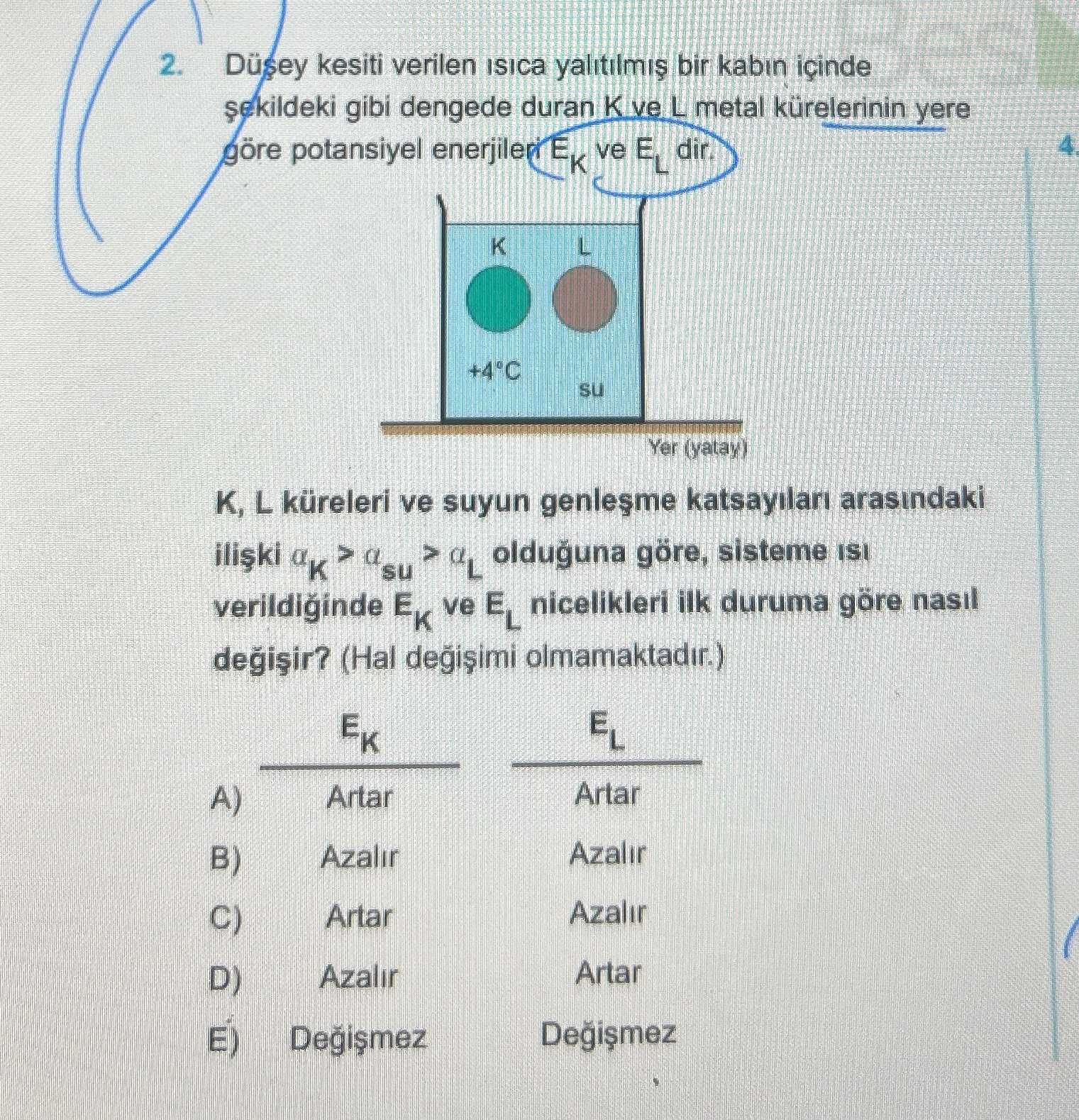 Düşey kesiti verilen ısıca yalıtılmış bir kabın içinde şekildeki gibi dengede duran K ve L metal