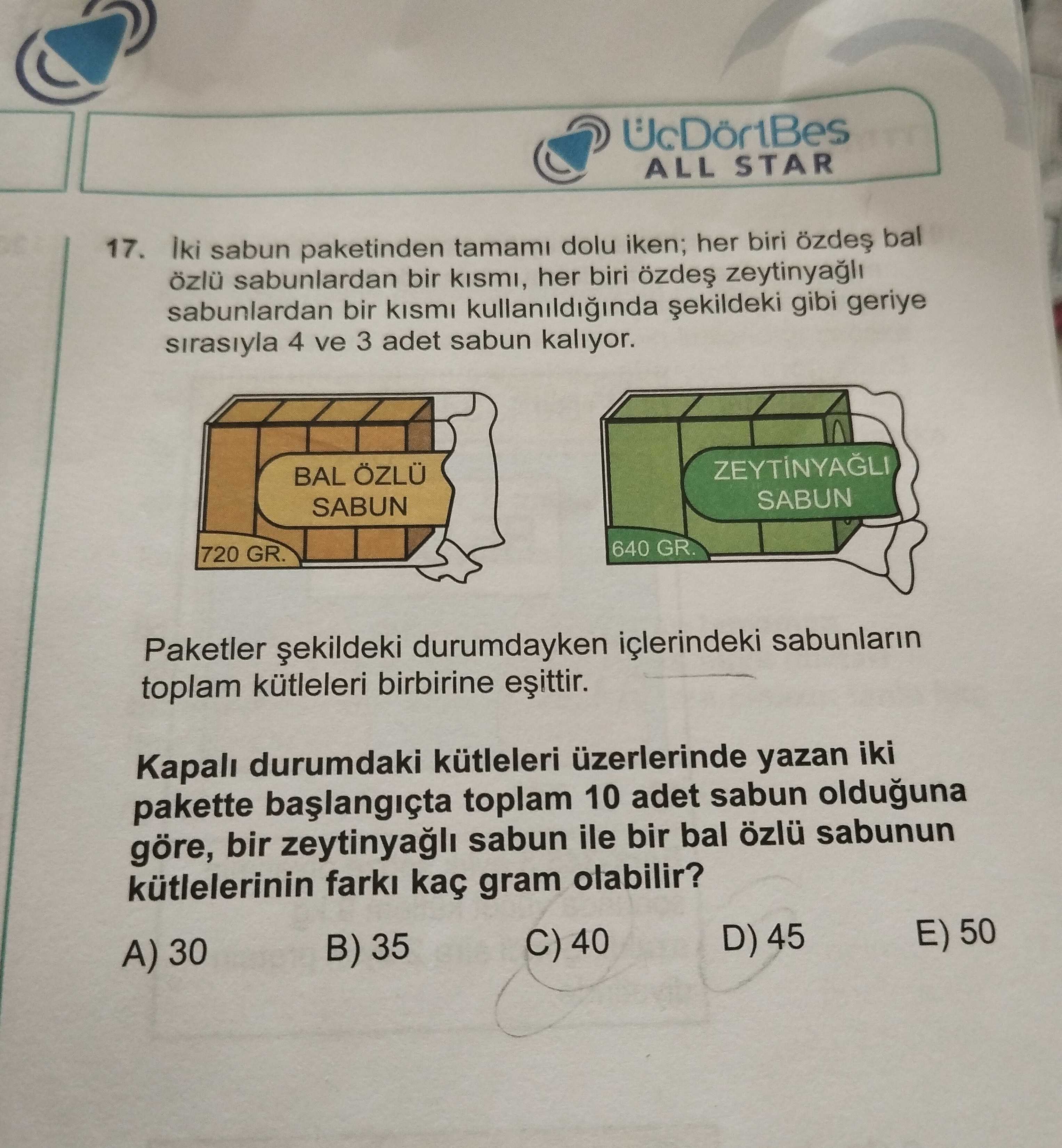 İki sabun paketinden tamamı dolu iken; her biri özdeş bal özlü sabunlardan bir kısmı, her biri özdeş