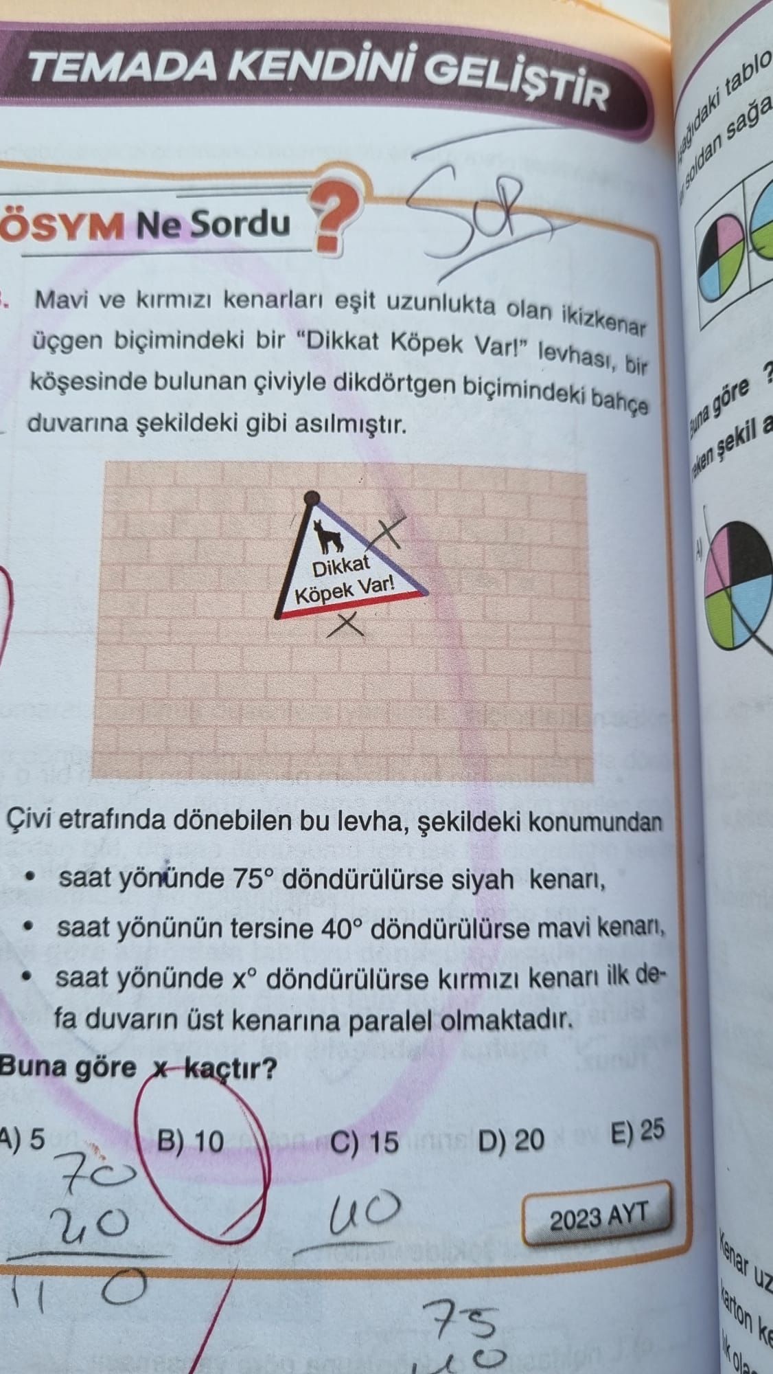 Mavi ve kırmızı kenarları eşit uzunlukta olan ikizkenar üçgen biçimindeki bir "Dikkat Köpek Var!"