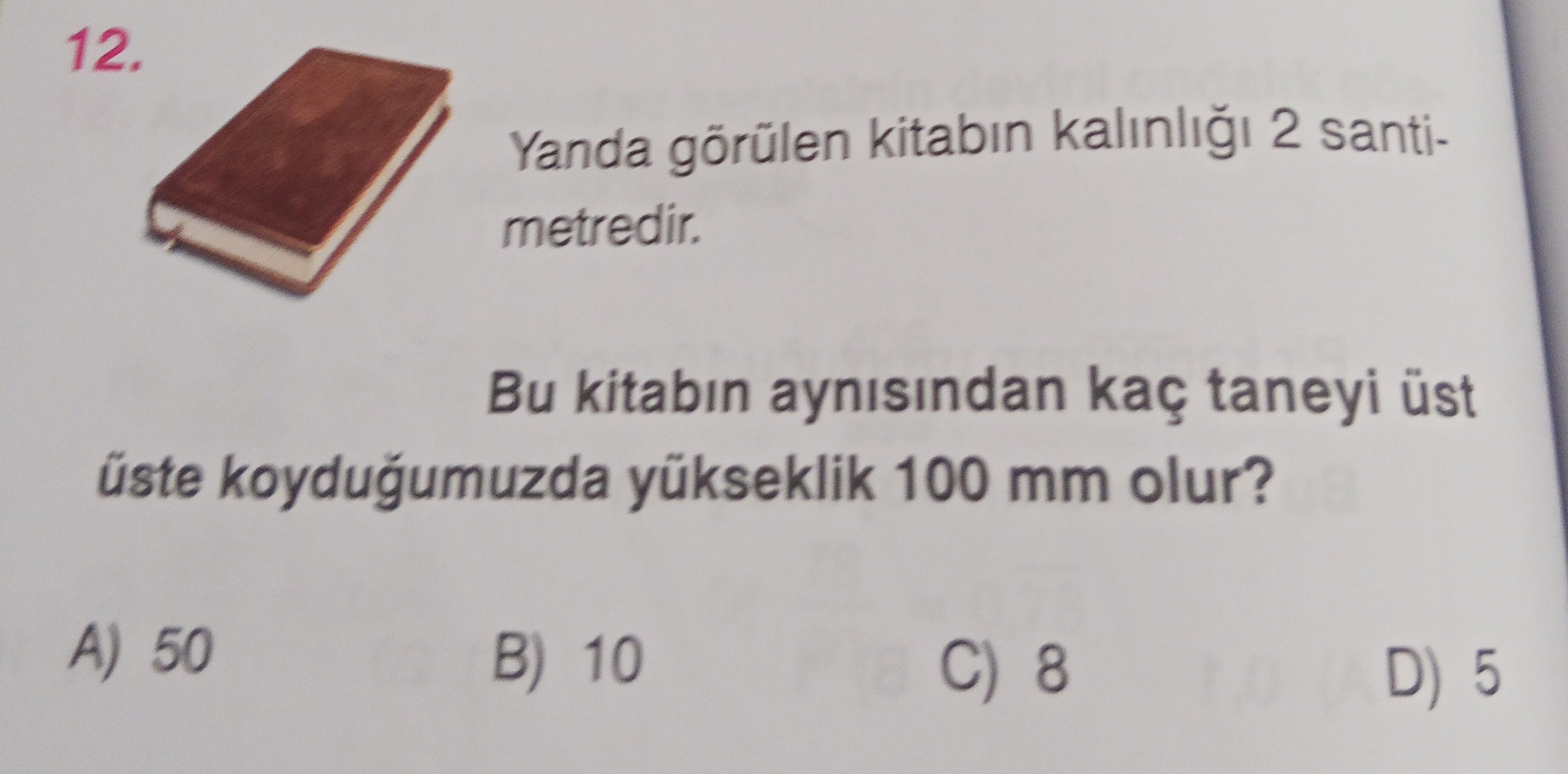 Yanda görülen kitabın kalınlığı 2 santi-metredir. Bu kitabın aynısından kaç taneyi üst üste