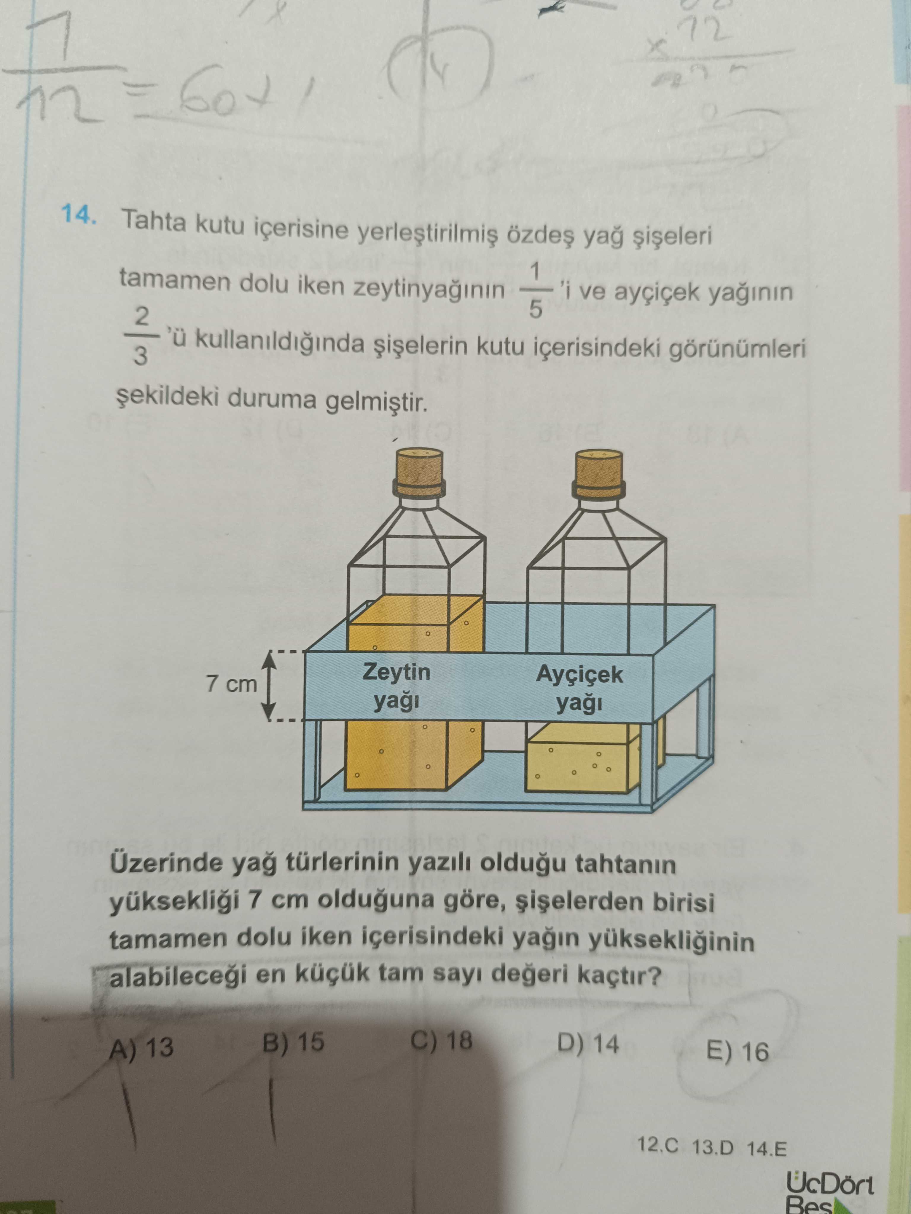 Tahta kutu içerisine yerleştirilmiş özdeş yağ şişeleri tamamen dolu iken zeytinyağının 1/5 'i ve