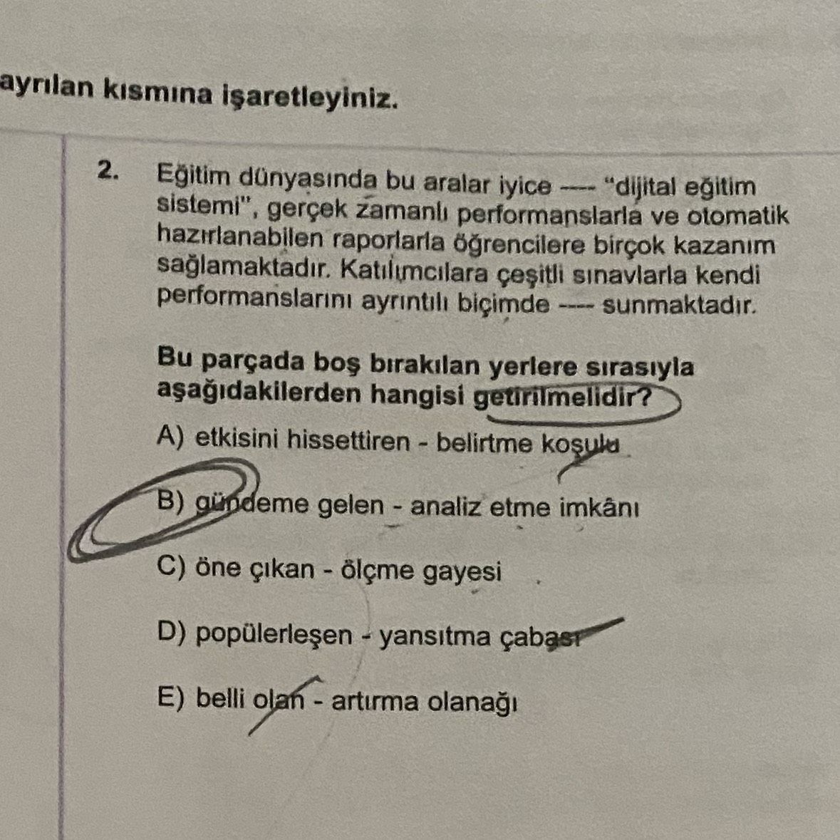 ayrılan kısmına işaretleyiniz. 2. Eğitim dünyasında bu aralar iyice ---- "dijital eğitim sistemi"