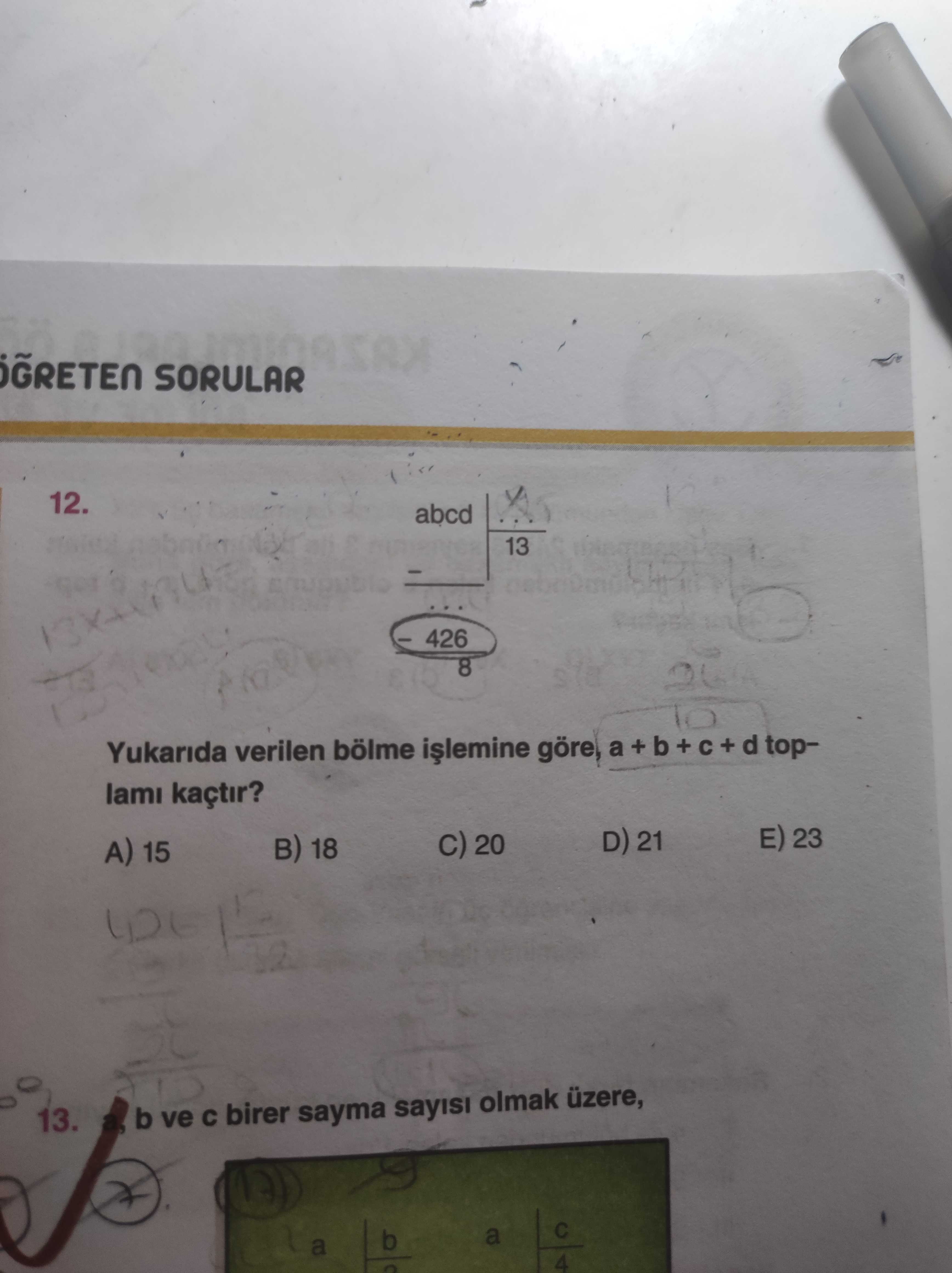 Yukarıda verilen bölme işlemine göre, a + b + c + d toplamı kaçtır?