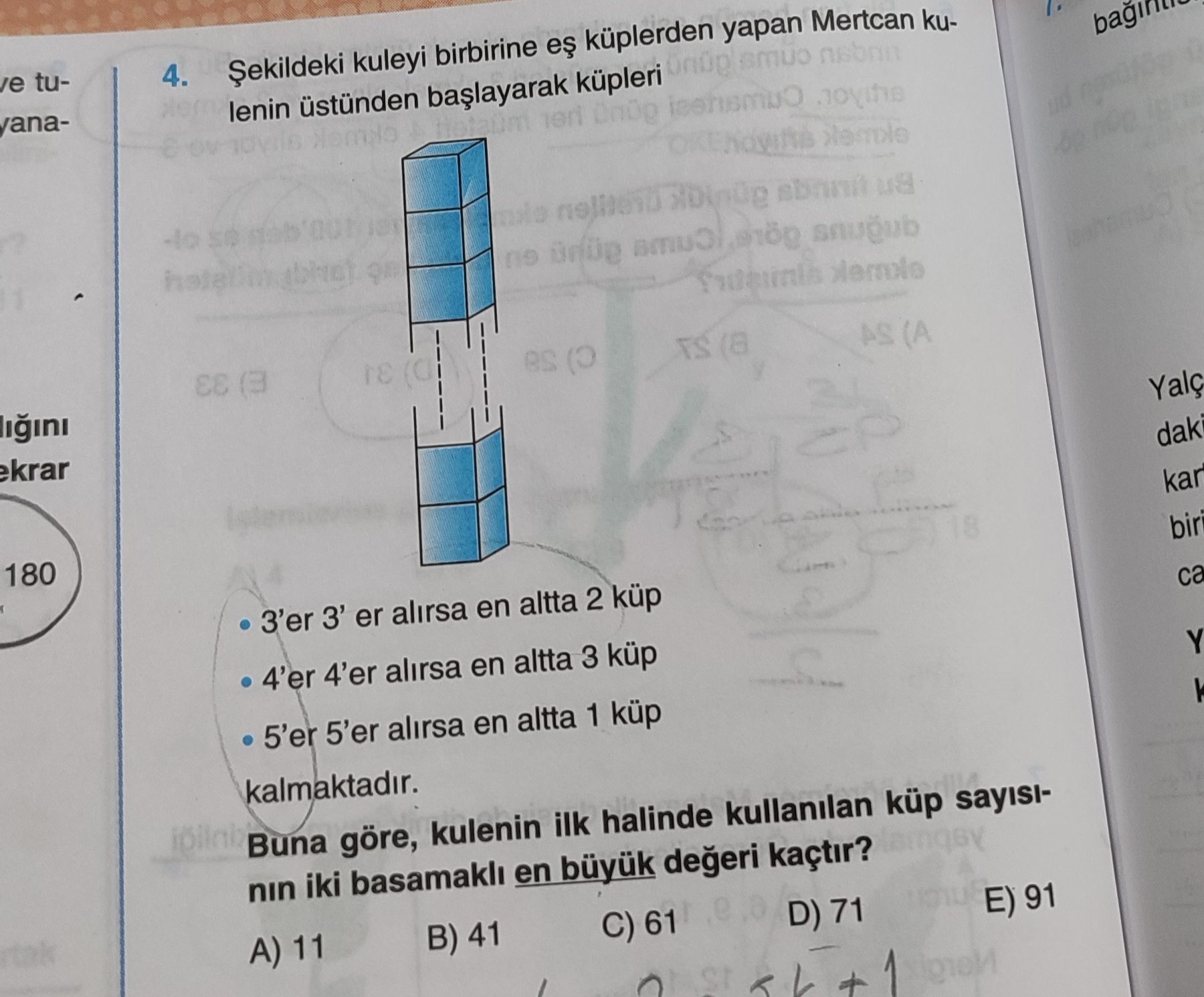 Şekildeki kuleyi birbirine eş küplerden yapan Mertcan kulenin üstünden başlayarak küpleri • 3'er
