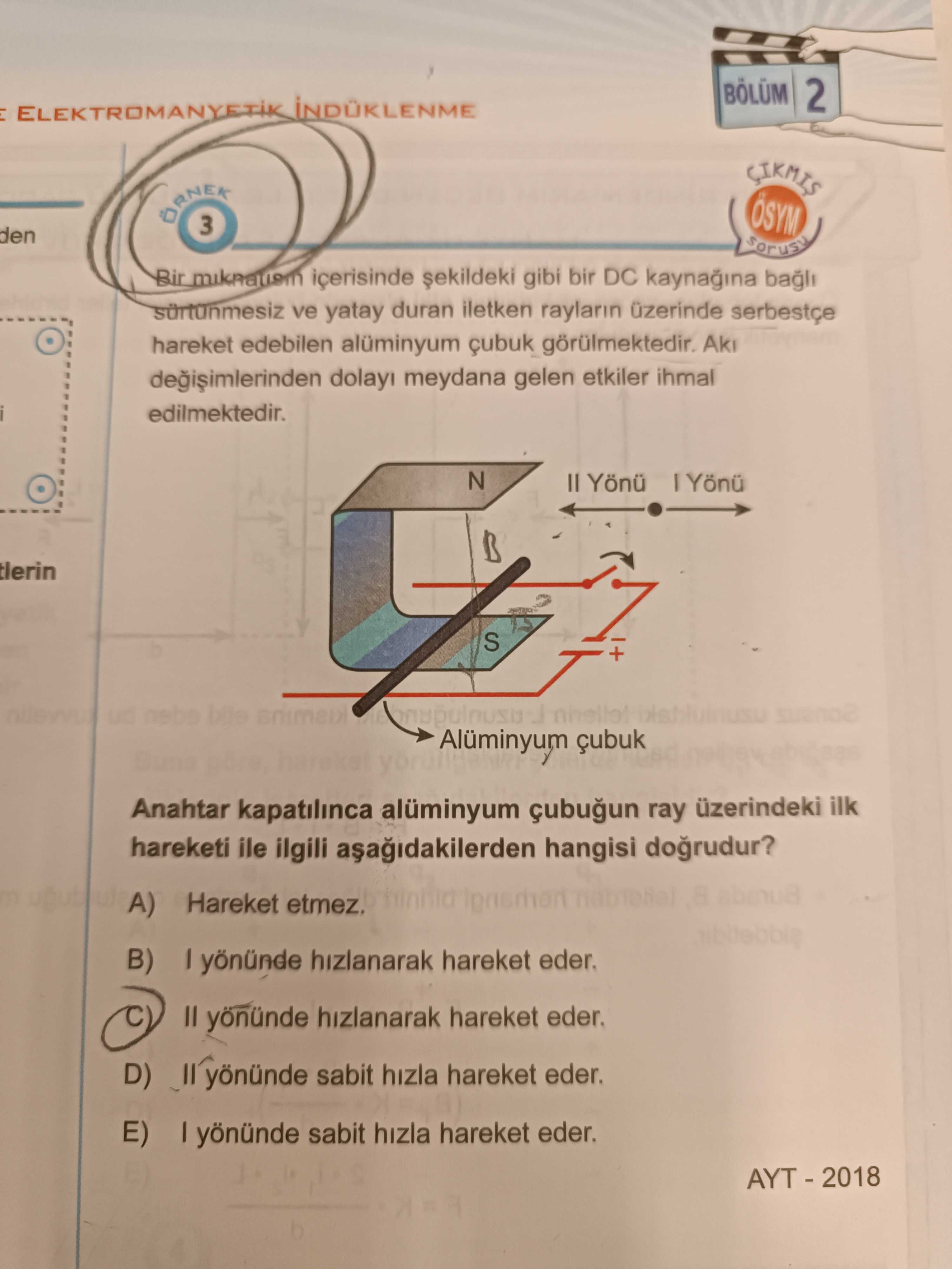 Bir mıknatısın içerisinde şekildeki gibi bir DC kaynağına bağlı sürtünmesiz ve yatay duran iletken
