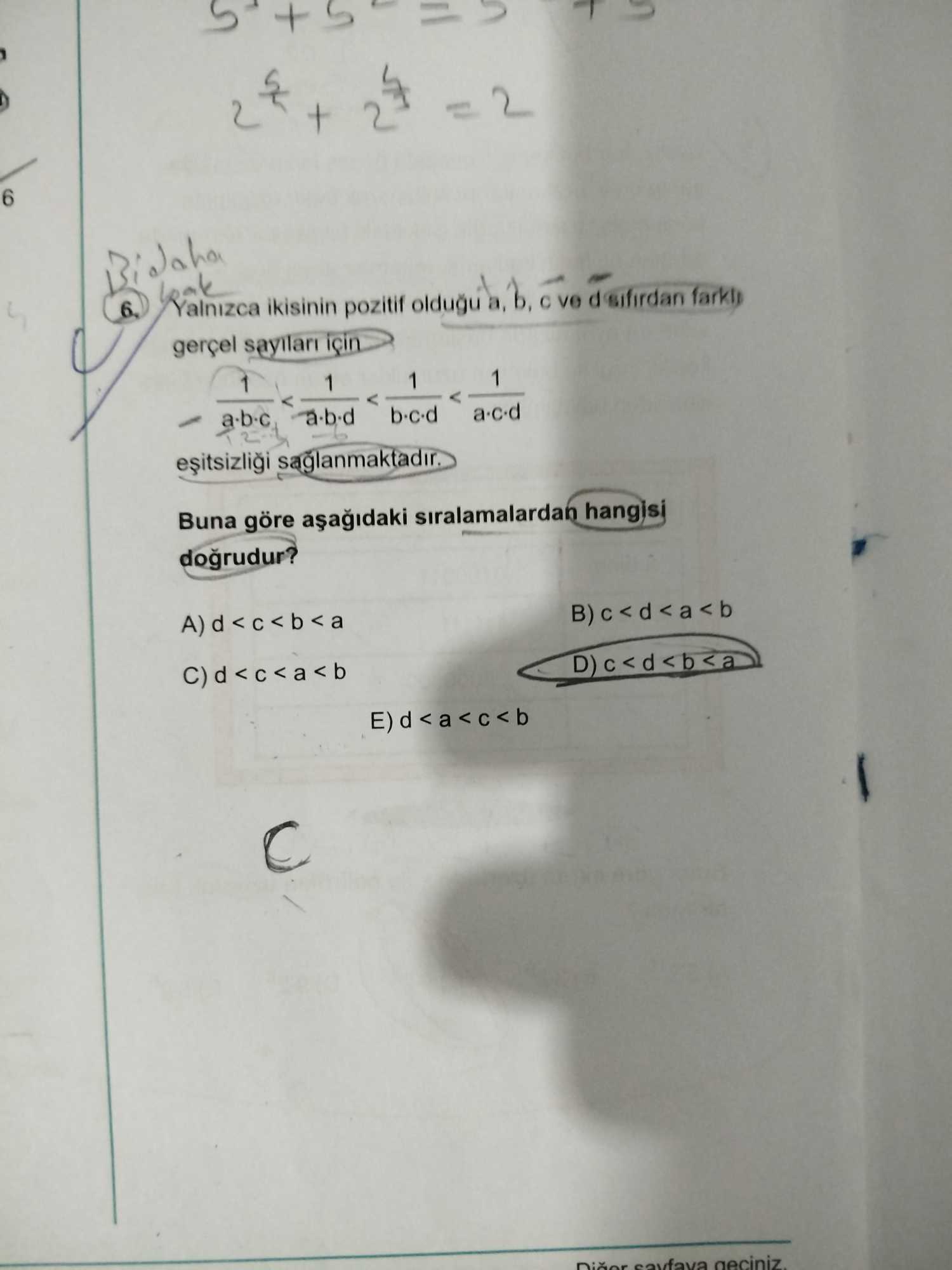 Yalnızca ikisinin pozitif olduğu a, b, c ve d sıfırdan farklı gerçel sayıları için - 1/(a·b·c) <