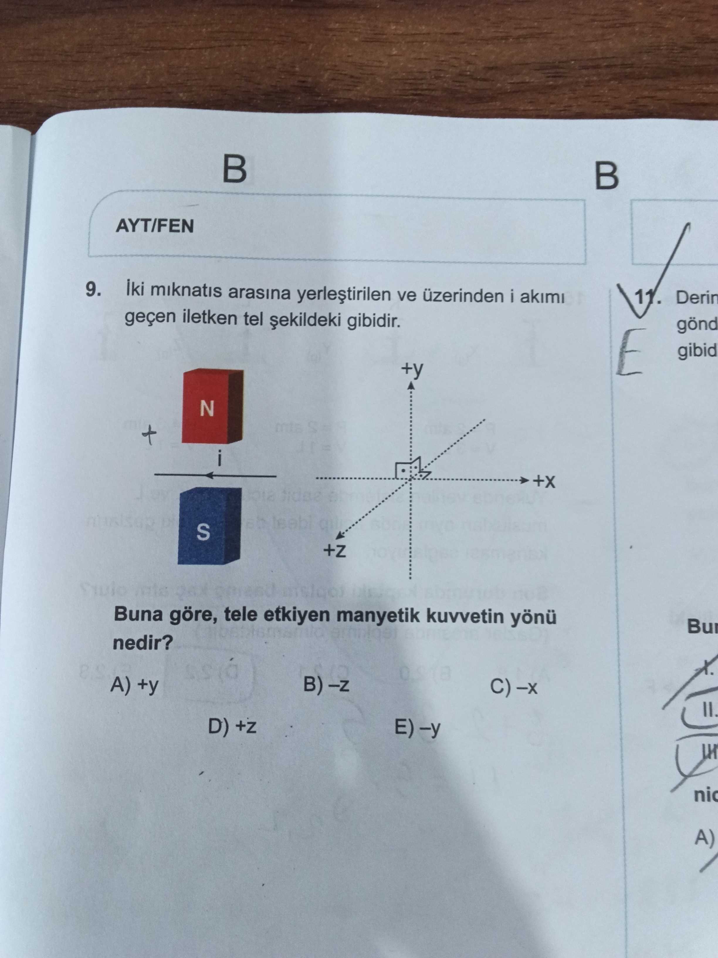 İki mıknatıs arasına yerleştirilen ve üzerinden i akımı geçen iletken tel şekildeki gibidir. Buna