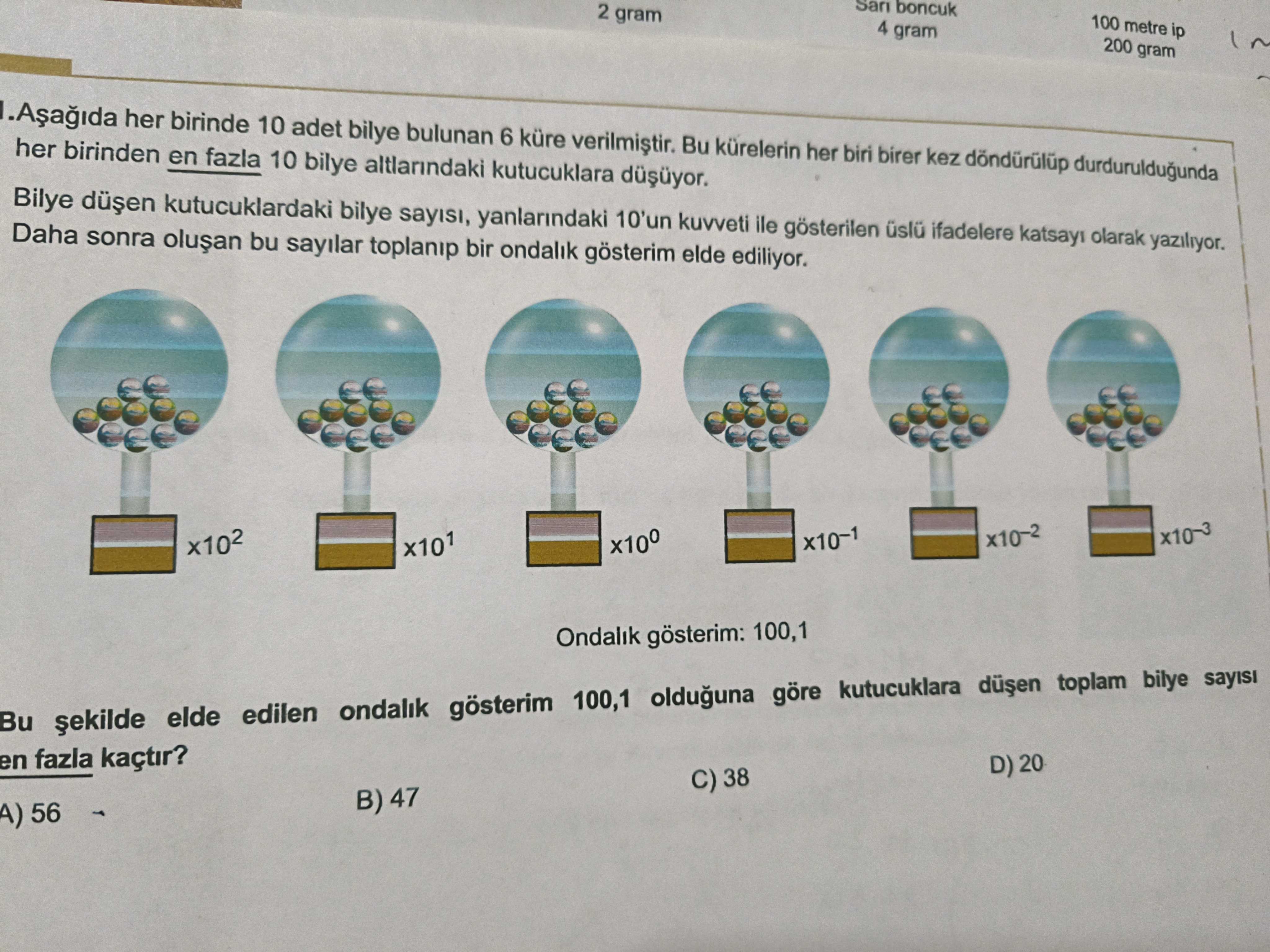 Aşağıda her birinde 10 adet bilye bulunan 6 küre verilmiştir. Bu kürelerin her biri birer kez