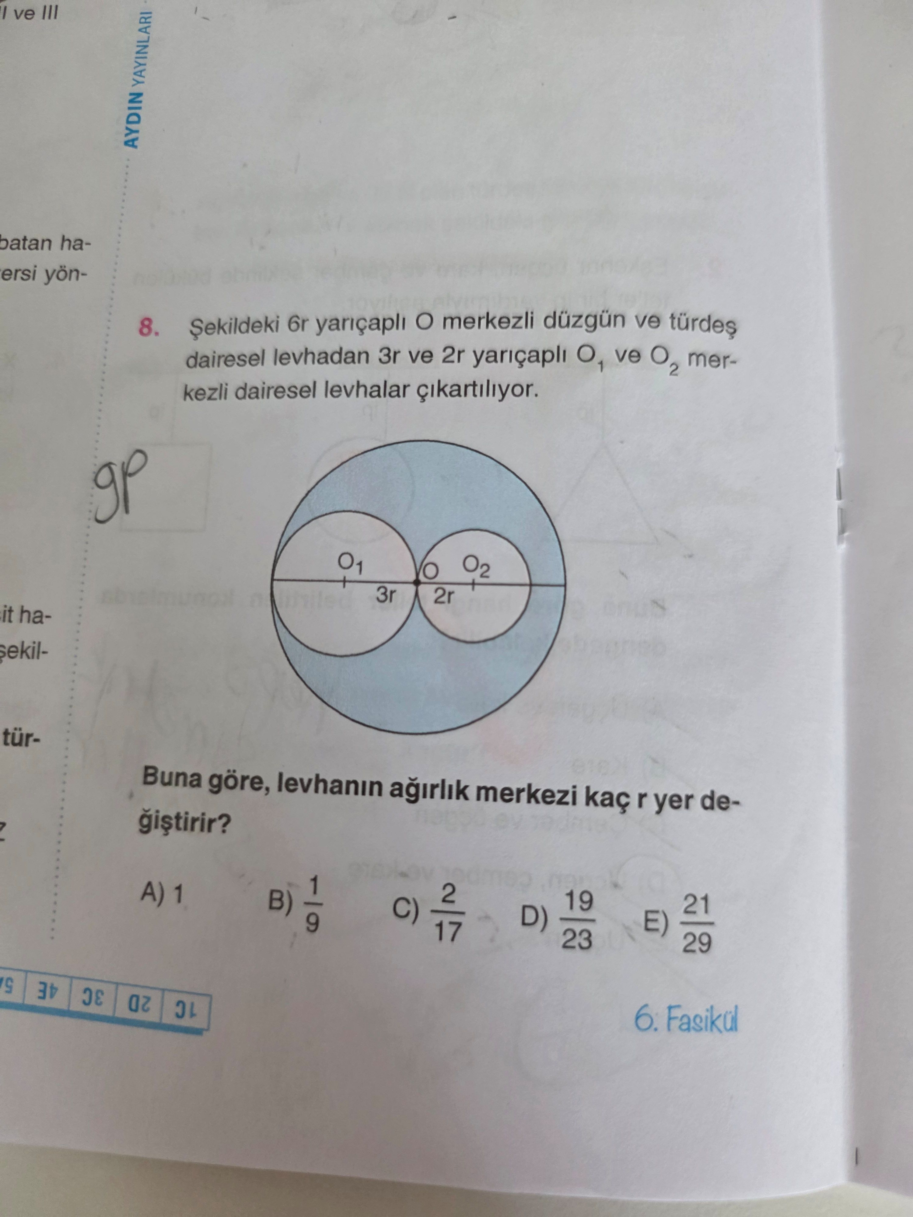 Şekildeki 6r yarıçaplı O merkezli düzgün ve türdeş dairesel levhadan 3r ve 2r yarıçaplı O₁ ve O₂