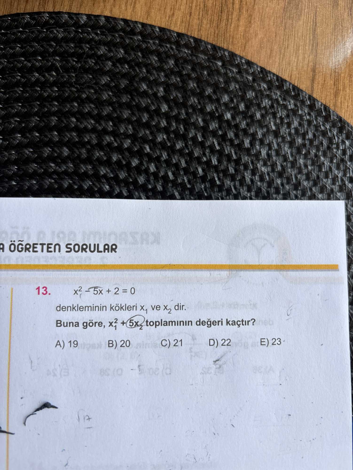 x² - 5x + 2 = 0 denkleminin kökleri x₁ ve x₂ dir. Buna göre, x₁² + 5x₂ toplamının değeri kaçtır?