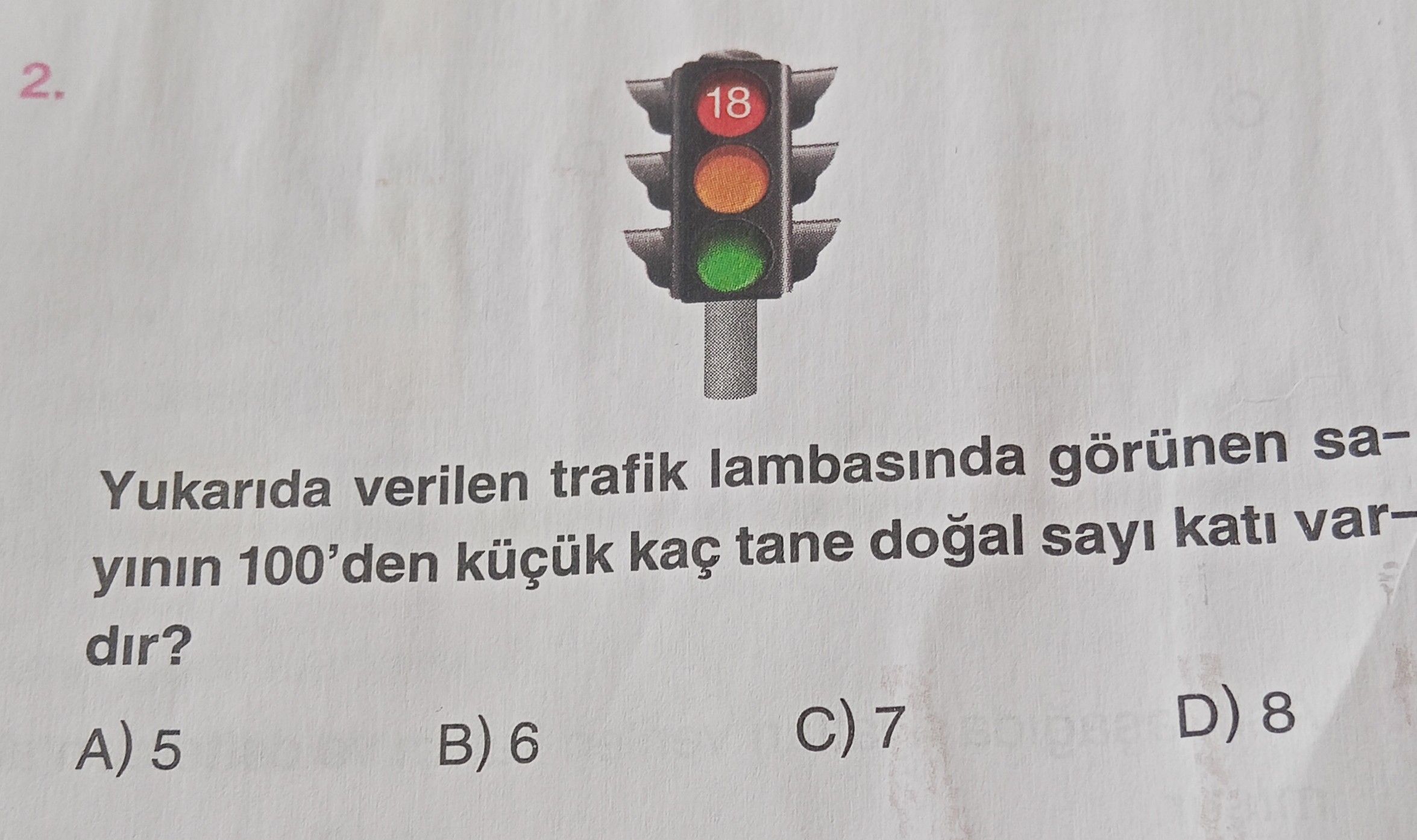 Yukarıda verilen trafik lambasında görünen sayının 100'den küçük kaç tane doğal sayı katı vardır?