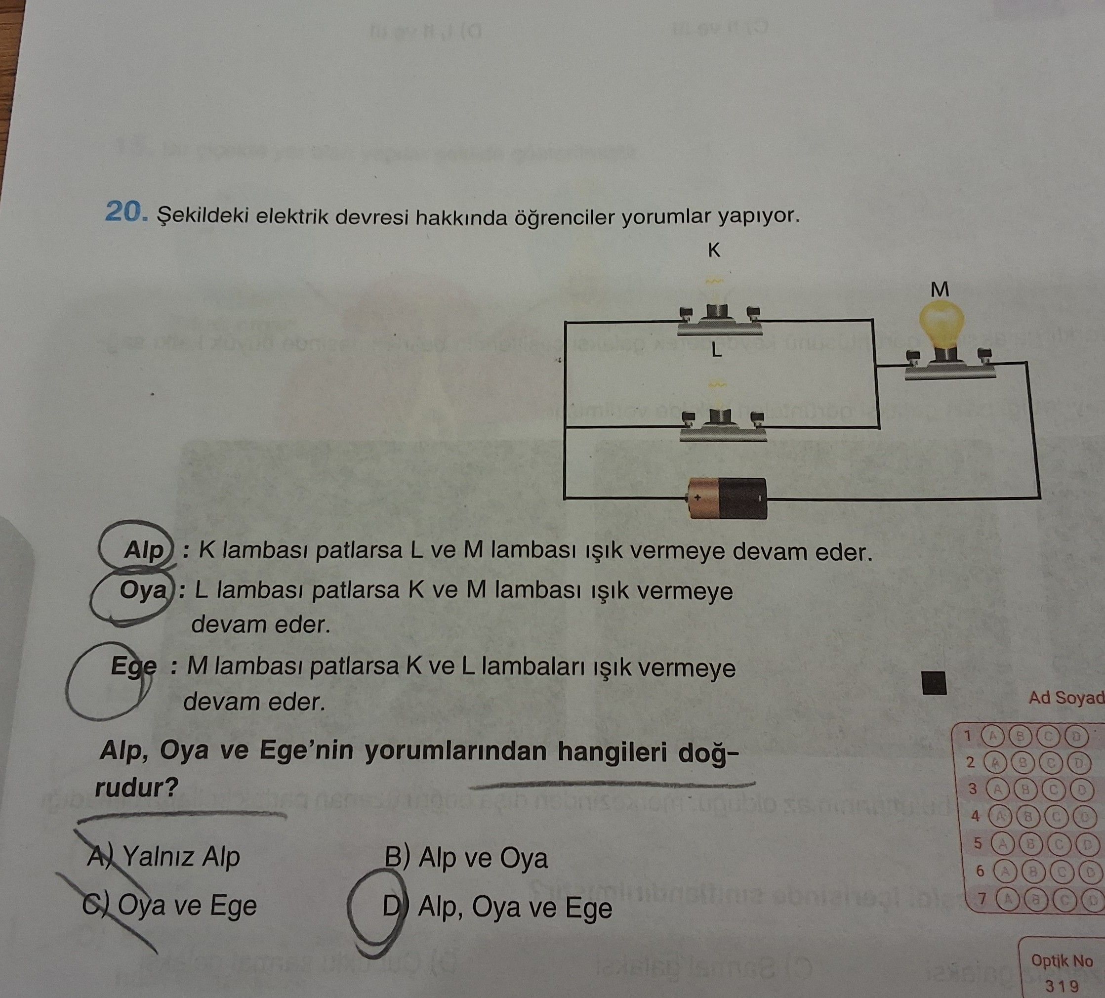 Şekildeki elektrik devresi hakkında öğrenciler yorumlar yapıyor. Alp : K lambası patlarsa L ve M