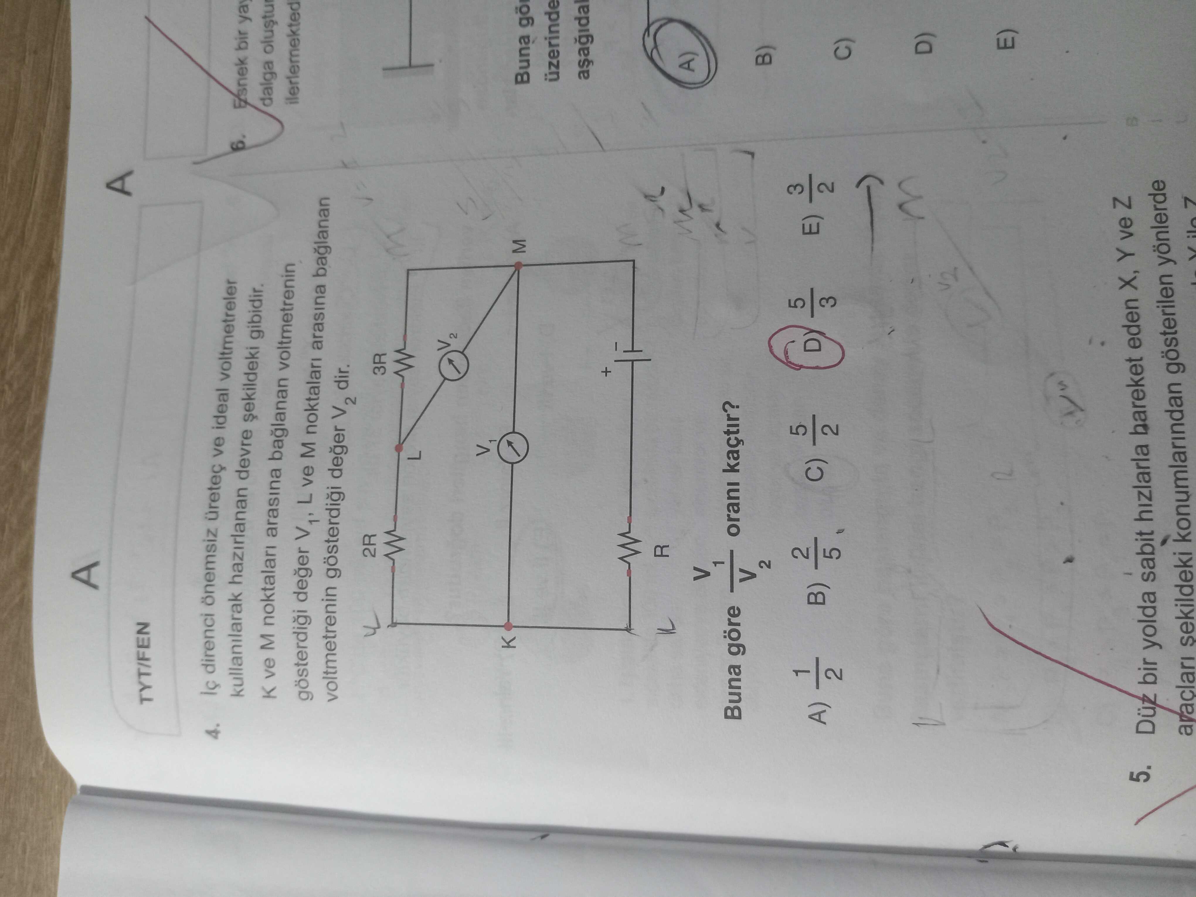 İç direnci önemsiz üreteç ve ideal voltmetreler kullanılarak hazırlanan devre şekildeki gibidir. K