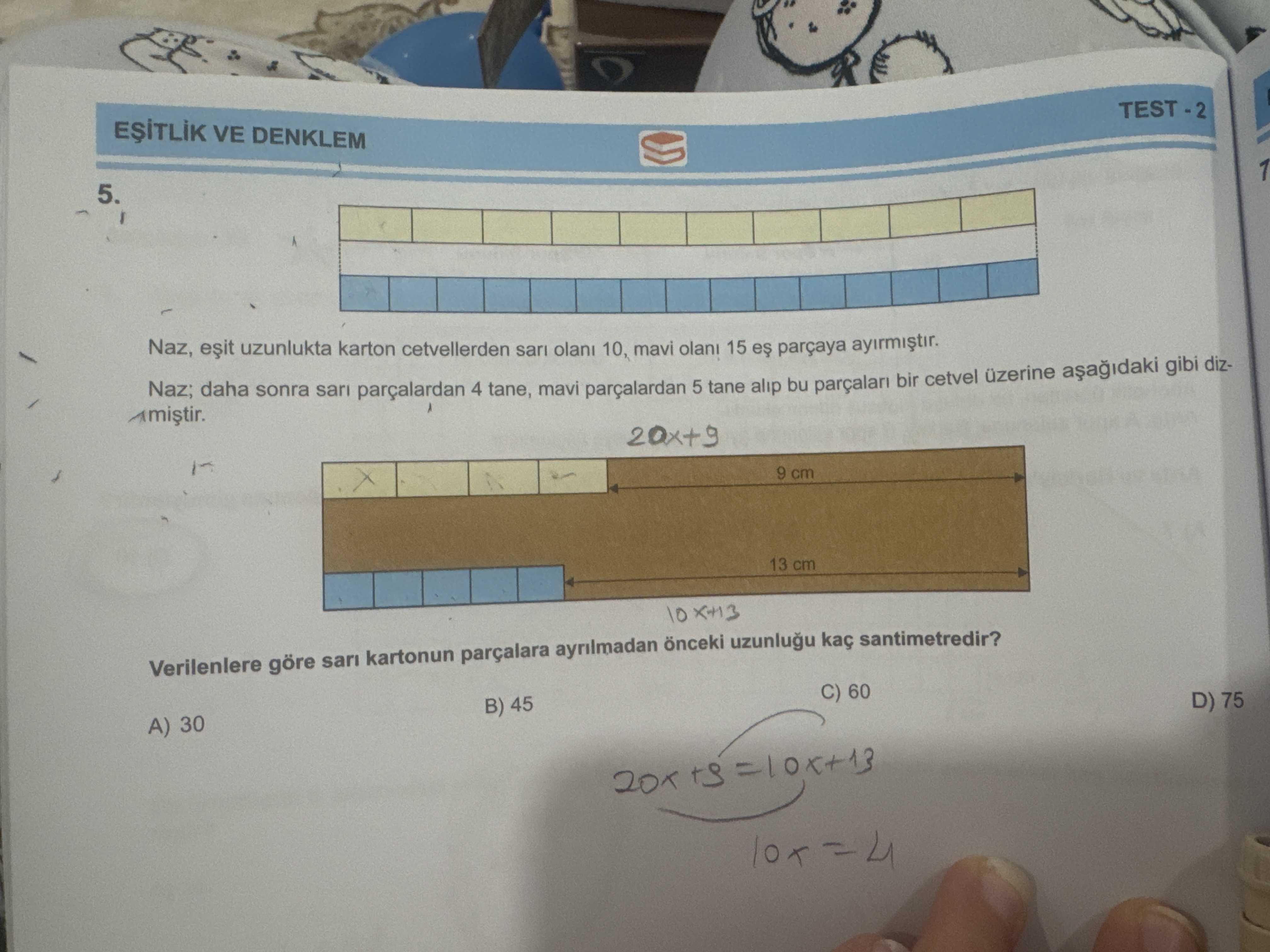 Naz, eşit uzunlukta karton cetvellerden sarı olanı 10, mavi olanı 15 eş parçaya ayırmıştır. Naz