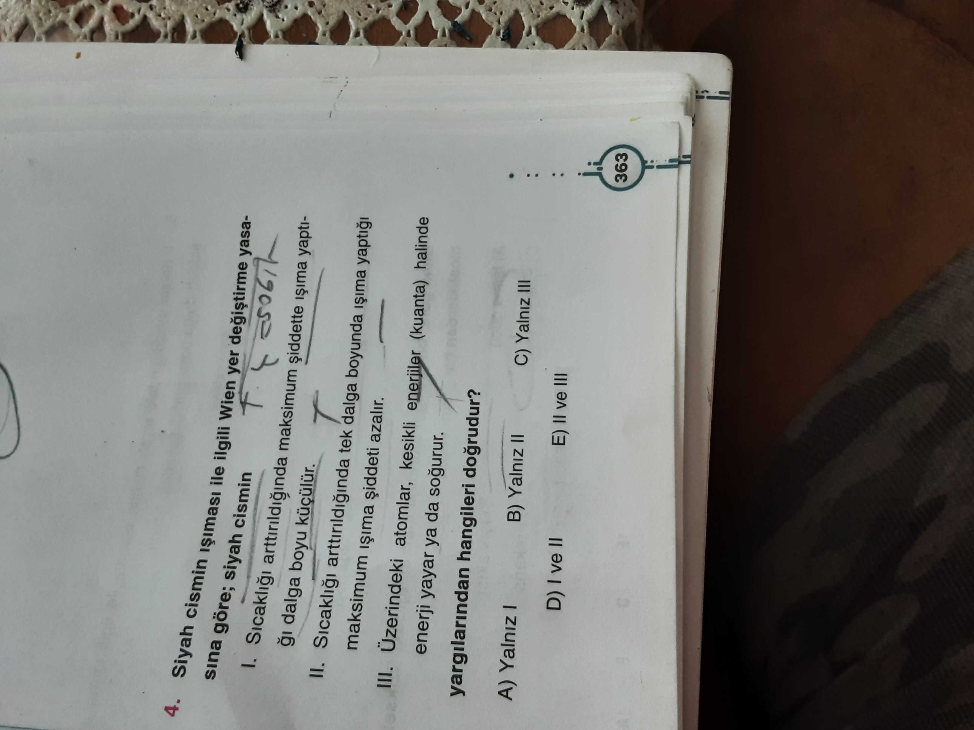 Siyah cismin ışıması ile ilgili Wien yer değiştirme yasasına göre; siyah cismin I. Sıcaklığı