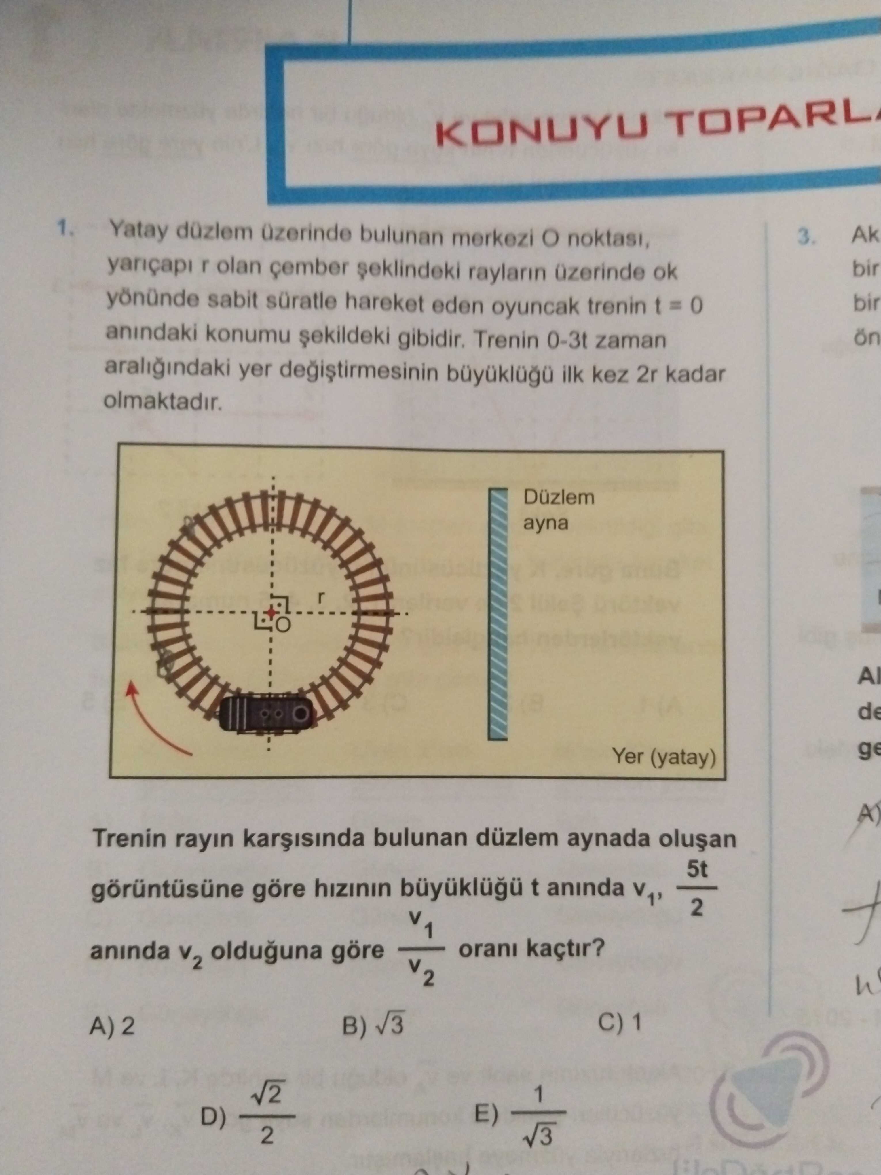 Yatay düzlem üzerinde bulunan merkezi O noktası, yarıçapı r olan çember şeklindeki rayların üzerinde
