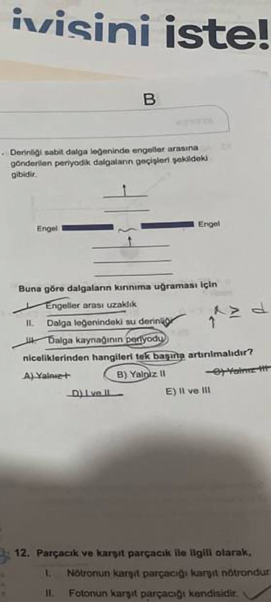 Derinliği sabit dalga leğeninde engeller arasına gönderilen periyodik dalgaların geçişleri şekildeki
