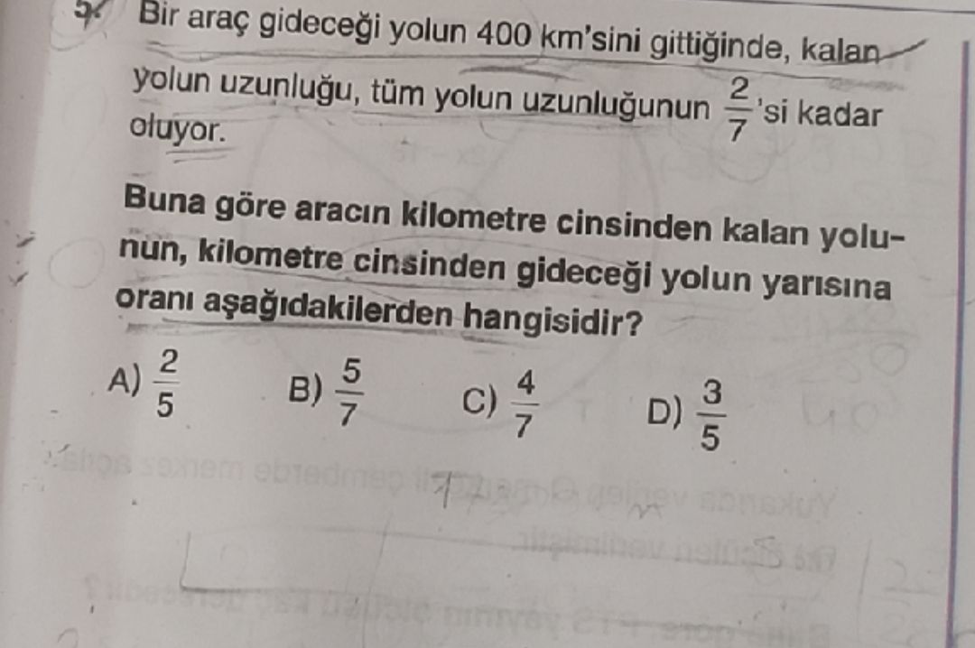 Bir araç gideceği yolun 400 km'sini gittiğinde, kalan yolun uzunluğu, tüm yolun uzunluğunun 2/7'si
