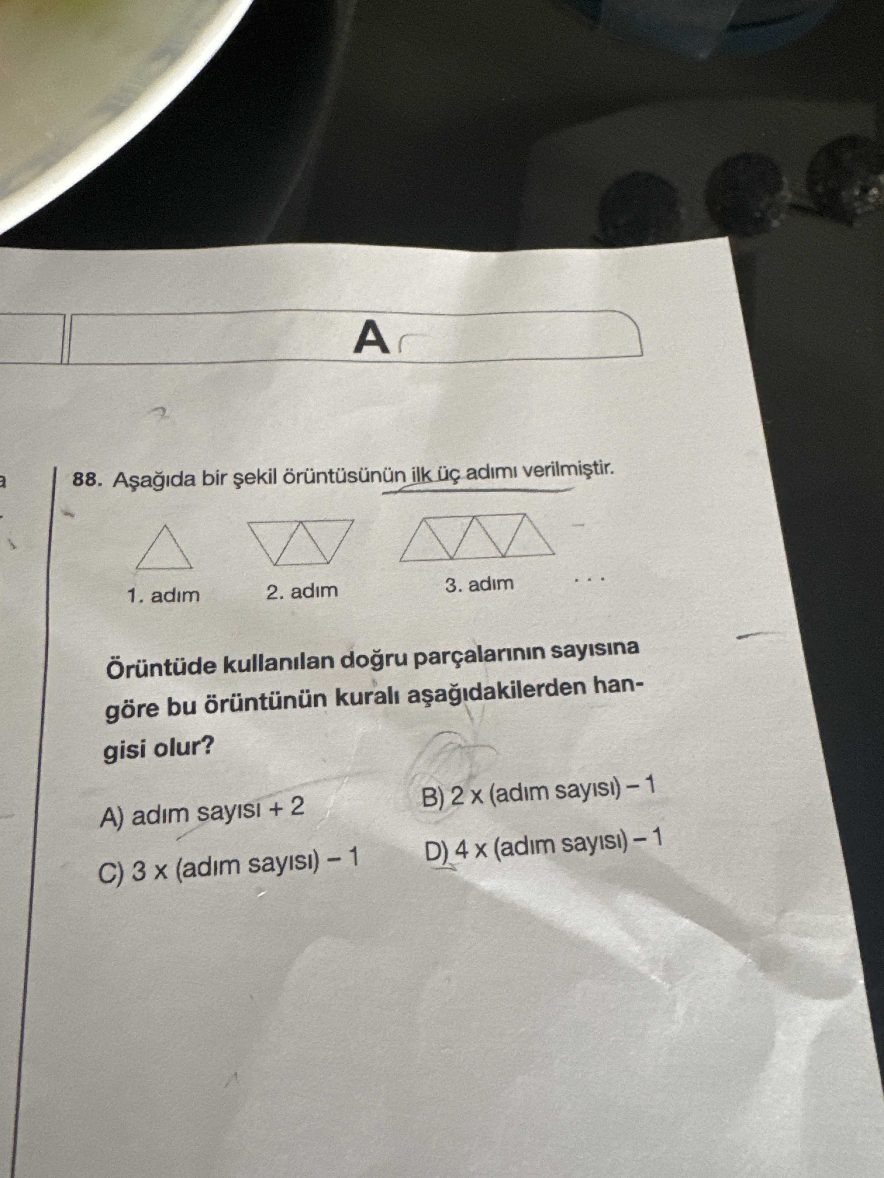 Aşağıda bir şekil örüntüsünün ilk üç adımı verilmiştir. 1. adım 2. adım 3. adım ... Örüntüde