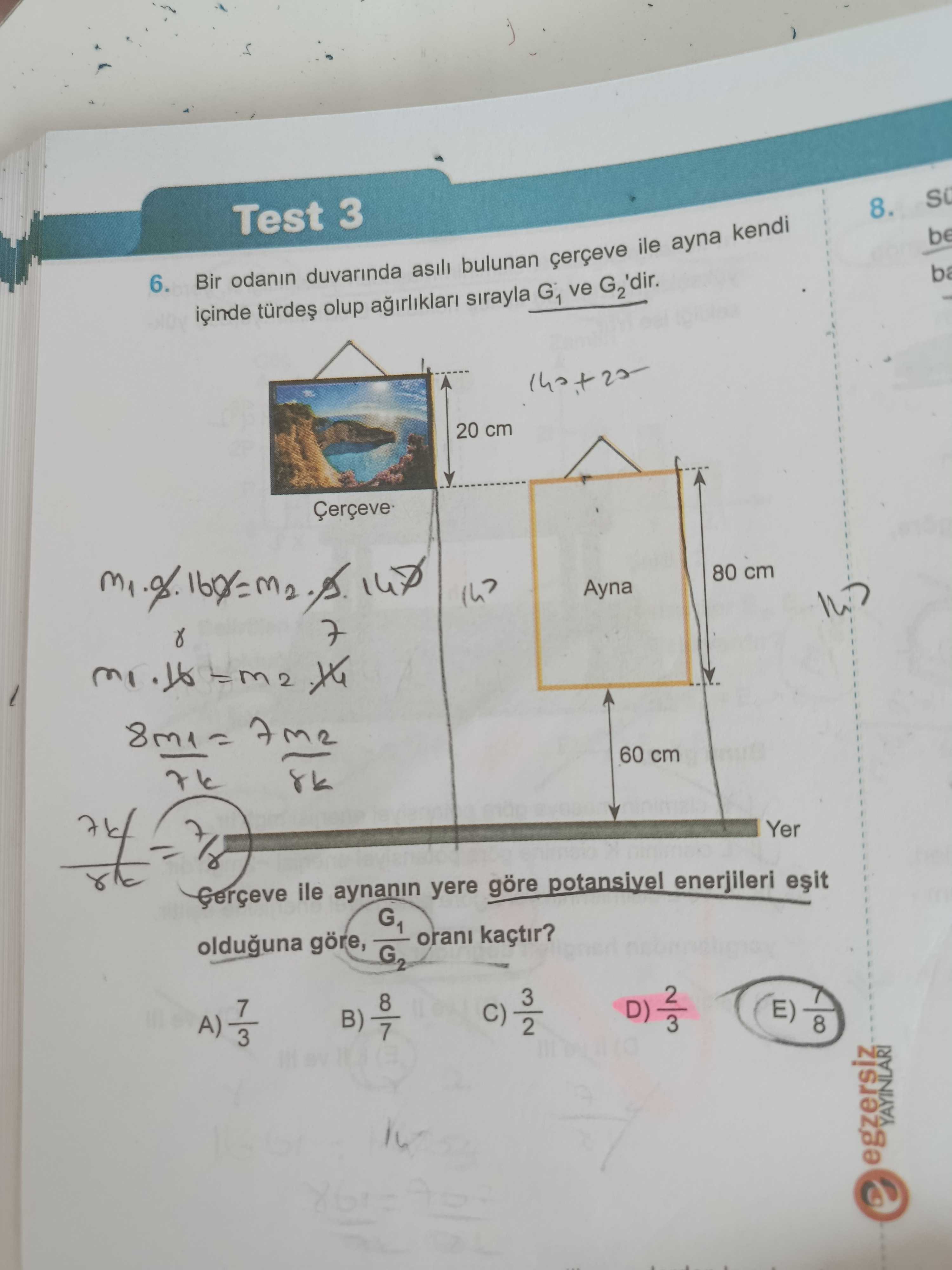 Bir odanın duvarında asılı bulunan çerçeve ile ayna kendi içinde türdeş olup ağırlıkları sırayla G₁