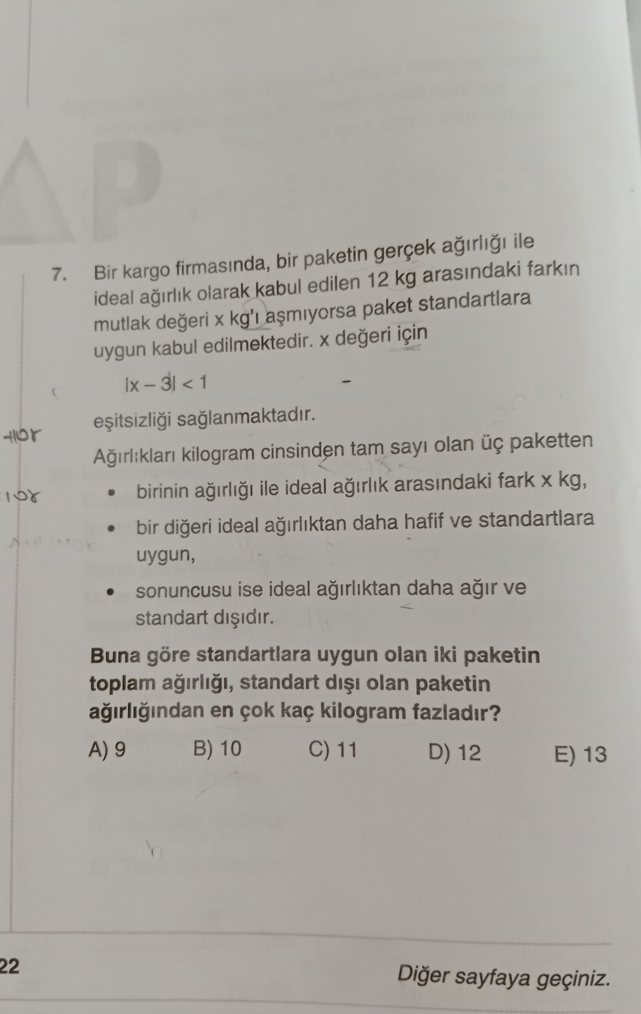 Bir kargo firmasında, bir paketin gerçek ağırlığı ile ideal ağırlık olarak kabul edilen 12 kg