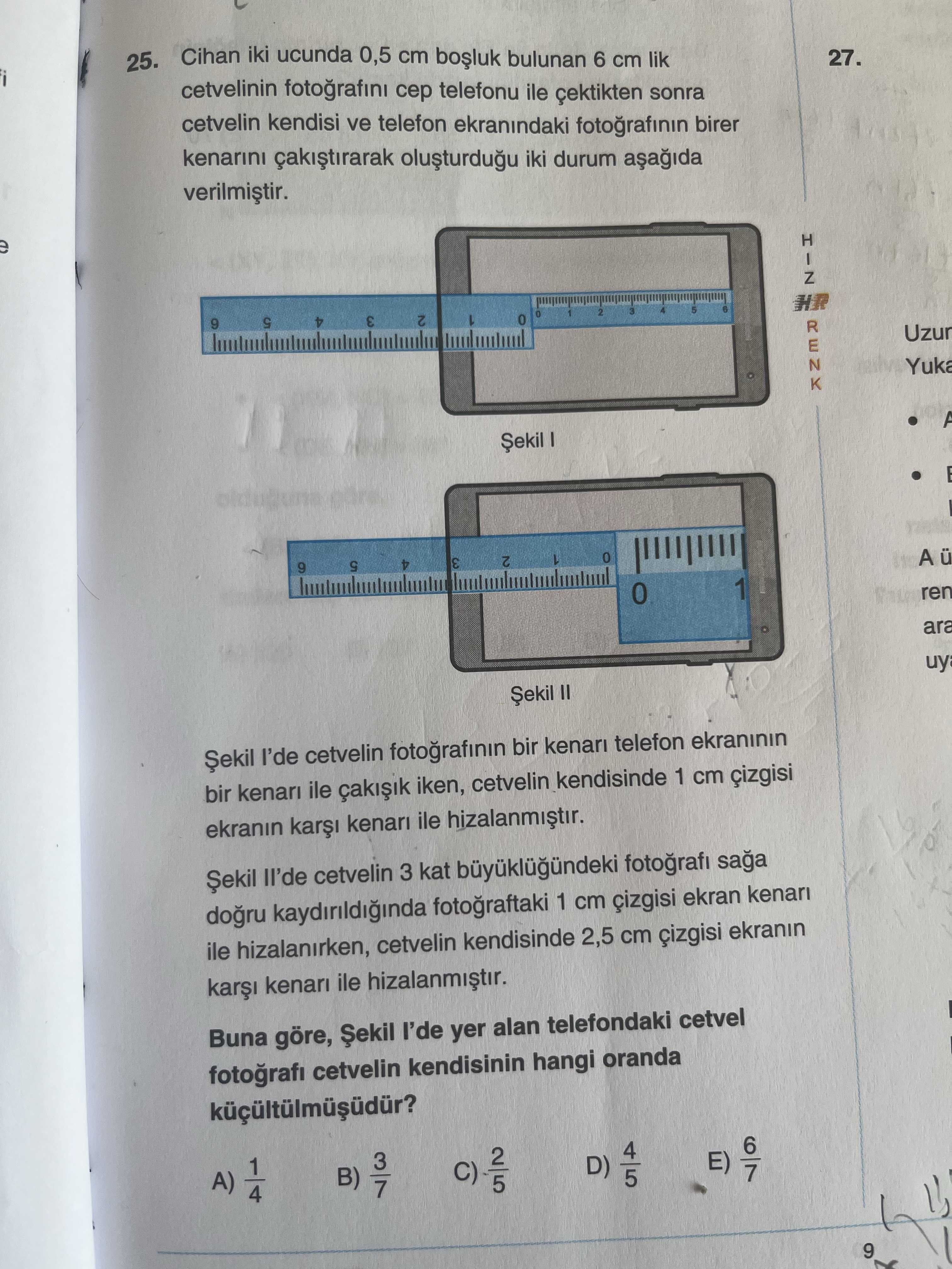 Cihan iki ucunda 0,5 cm boşluk bulunan 6 cm lik cetvelinin fotoğrafını cep telefonu ile çektikten