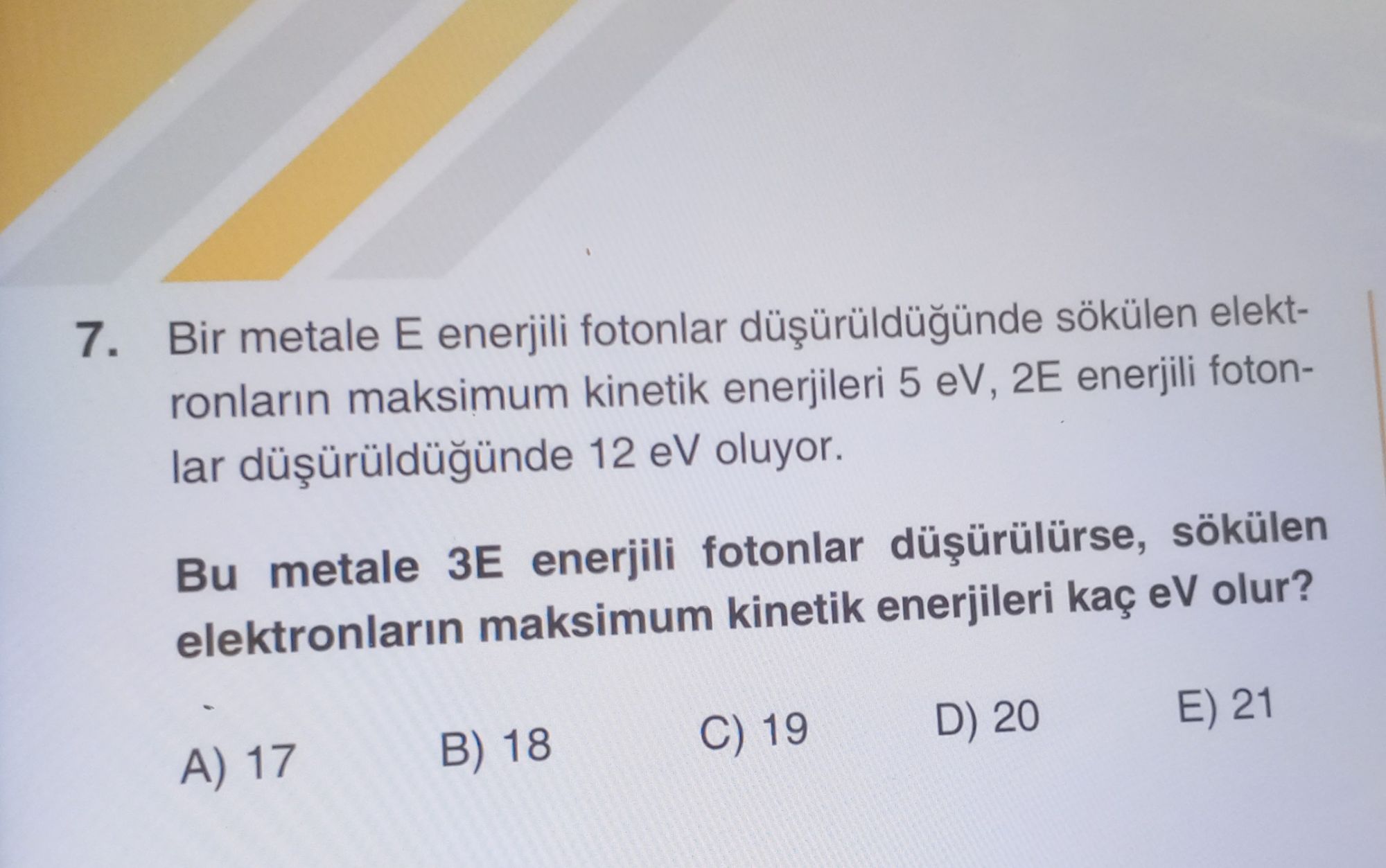Bir metale E enerjili fotonlar düşürüldüğünde sökülen elektronların maksimum kinetik enerjileri 5